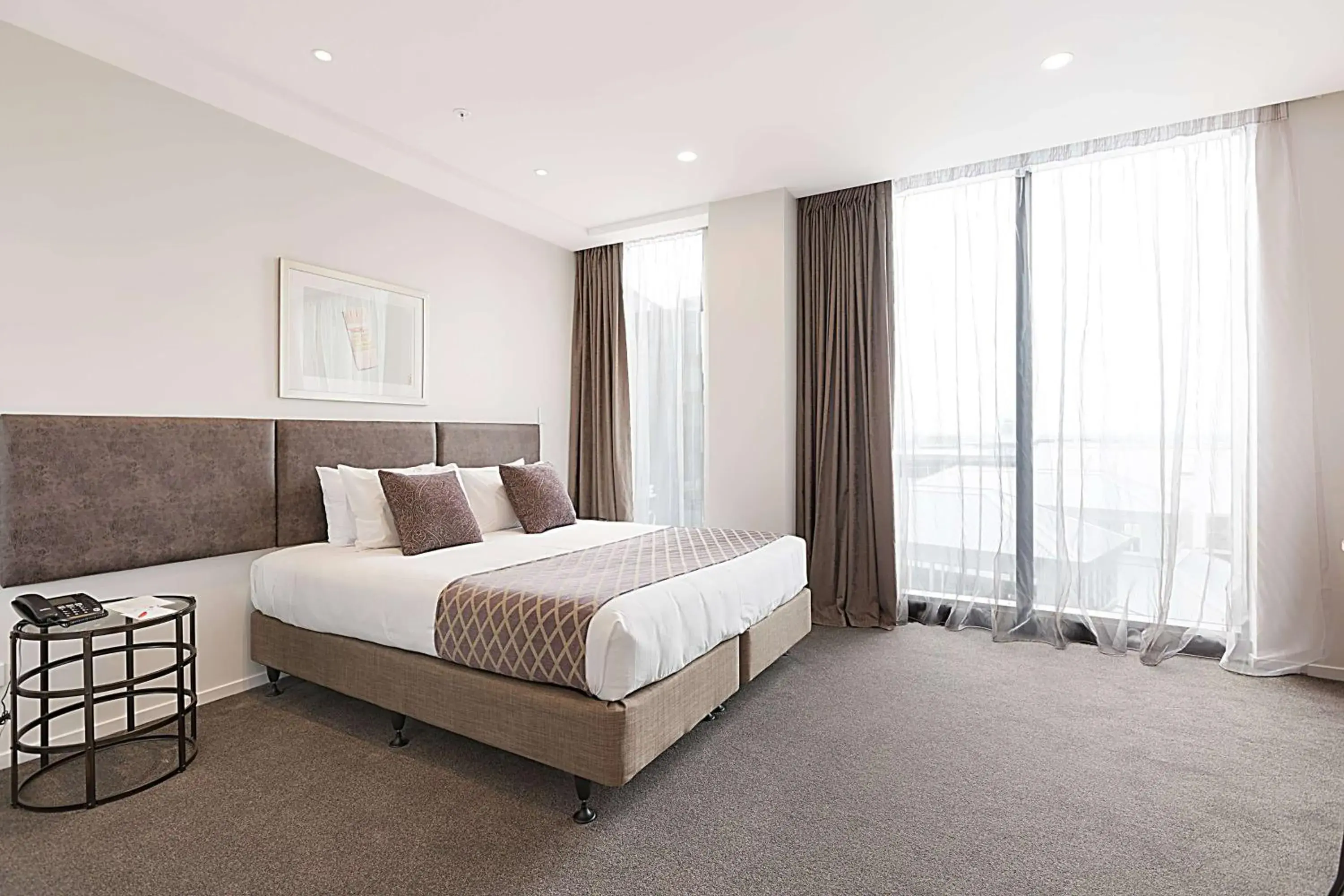 Photo of the whole room, Bed in Ramada Suites By Wyndham Victoria Street West Photo of the whole room, Bed in Ramada Suites By Wyndham Victoria Street West