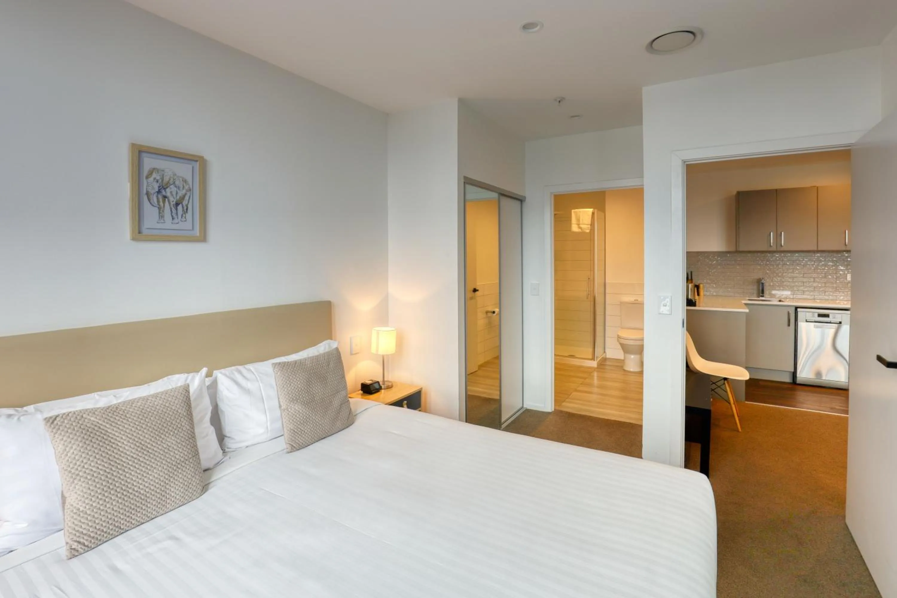 Bed in Ramada Suites By Wyndham Victoria Street West