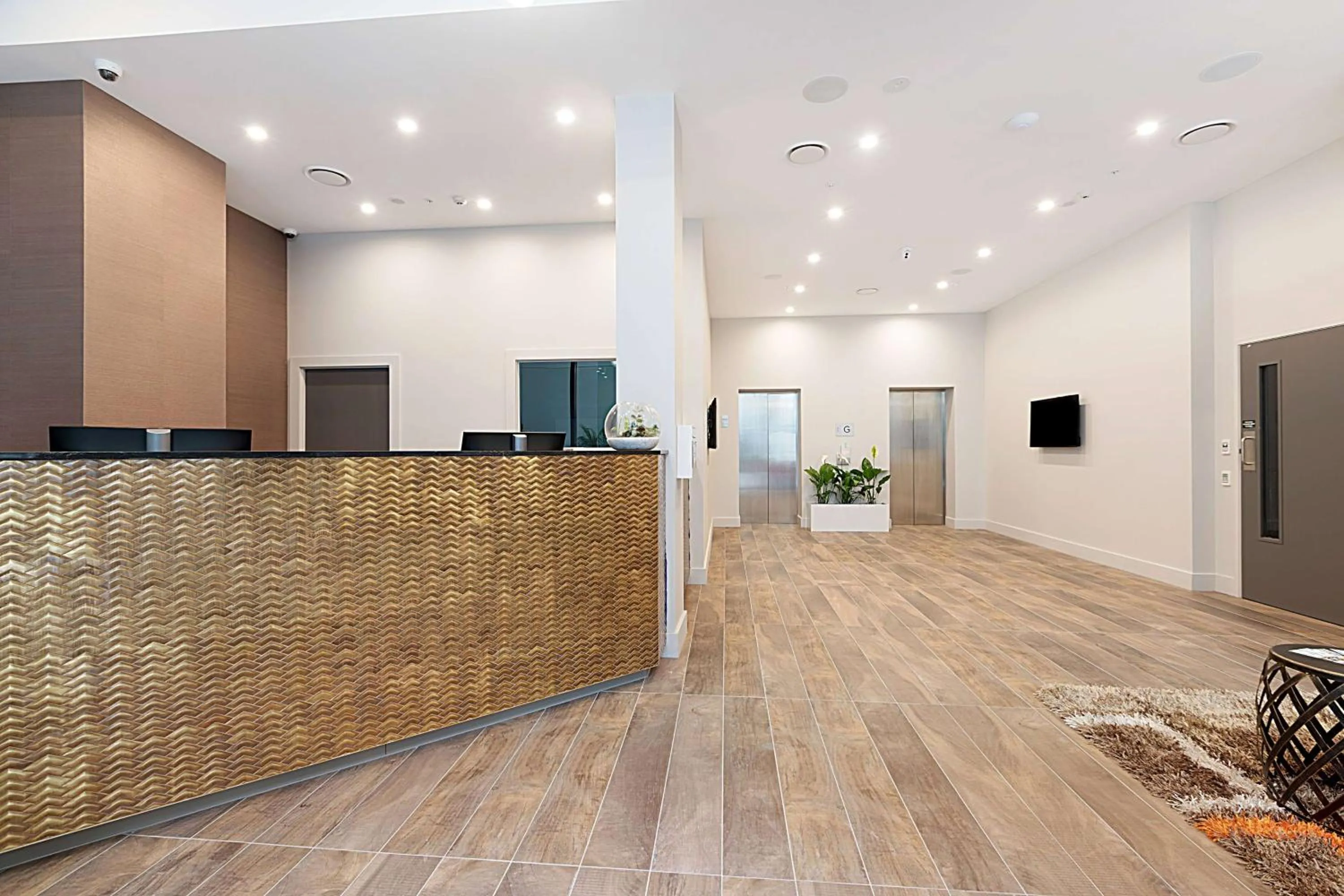 Lobby or reception in Ramada Suites By Wyndham Victoria Street West