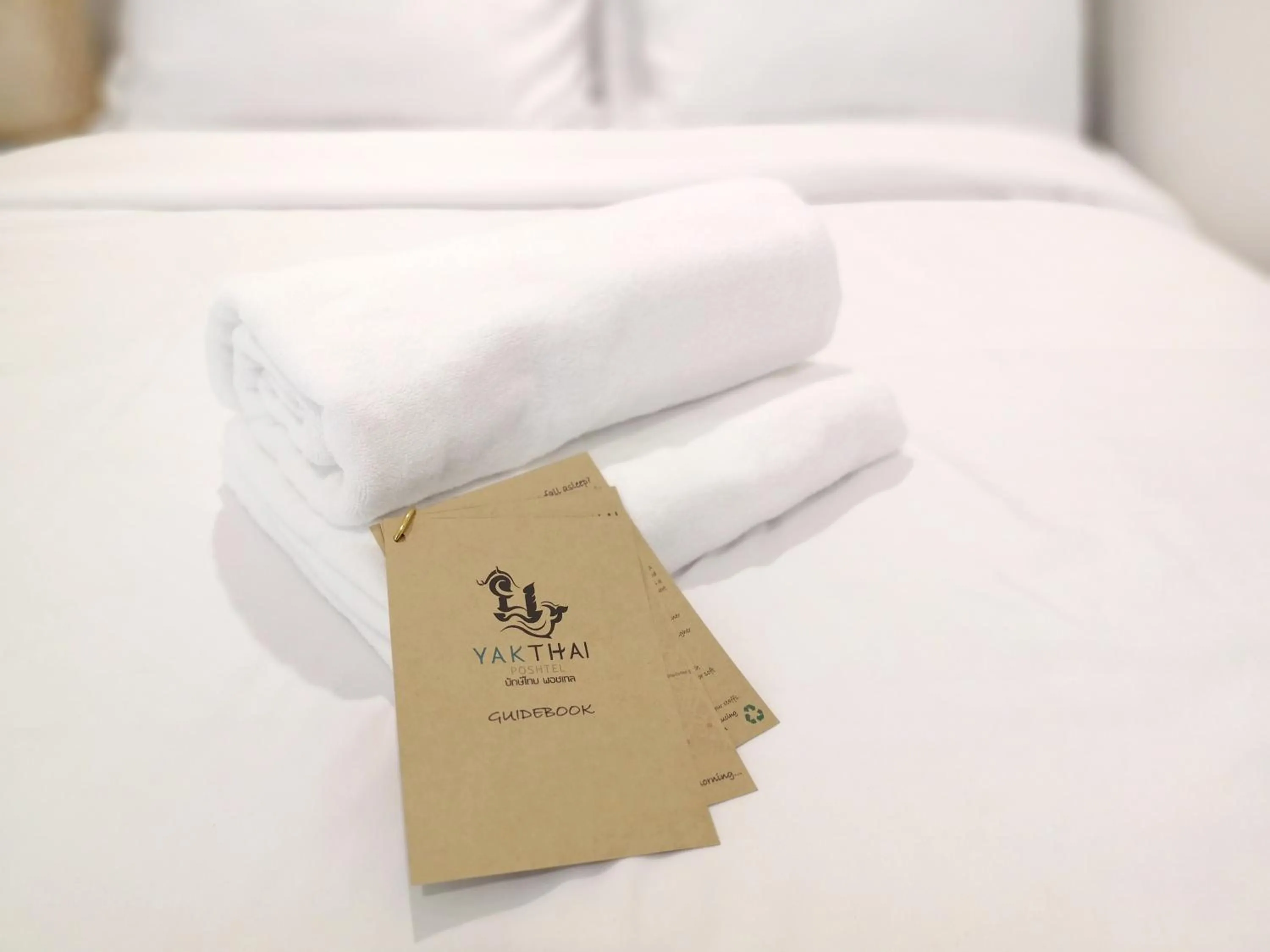 Bed in YAKTHAI POSHTEL