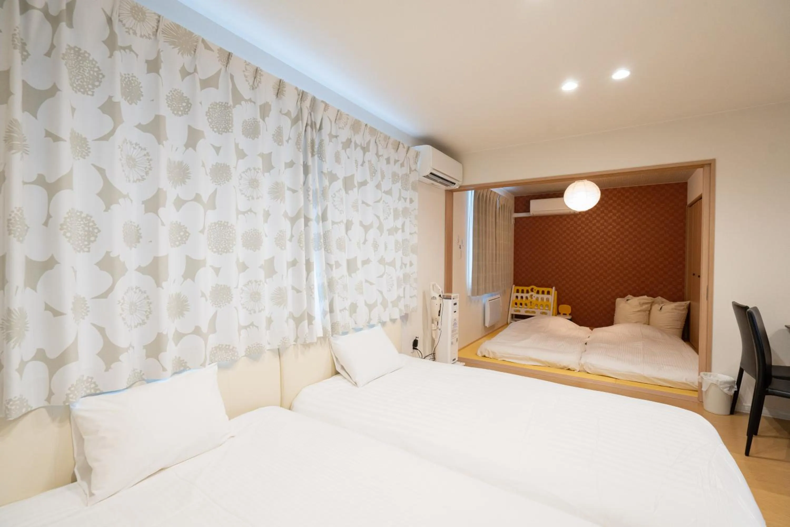 Bed in The Peak Villa Suite Hokkaido