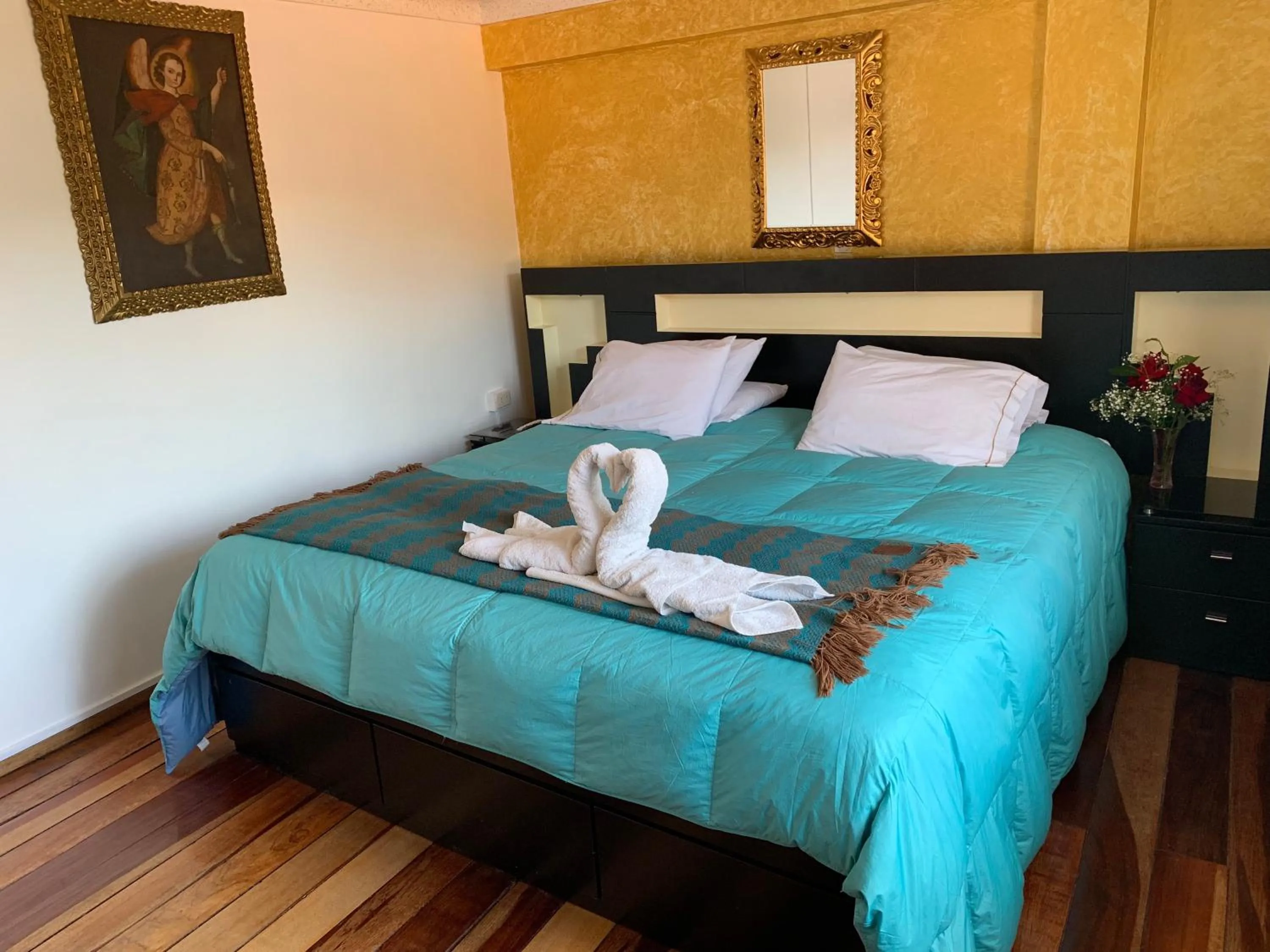 Decorative detail, Bed in Hostal Qolqampata