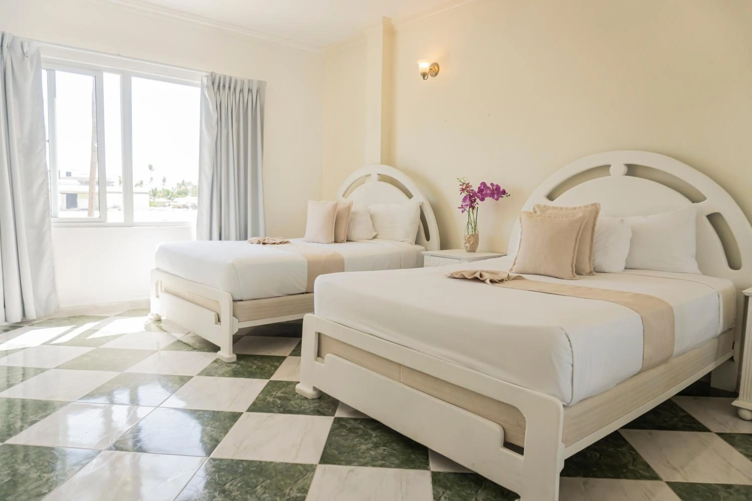 Bed in Green Coast Hotel