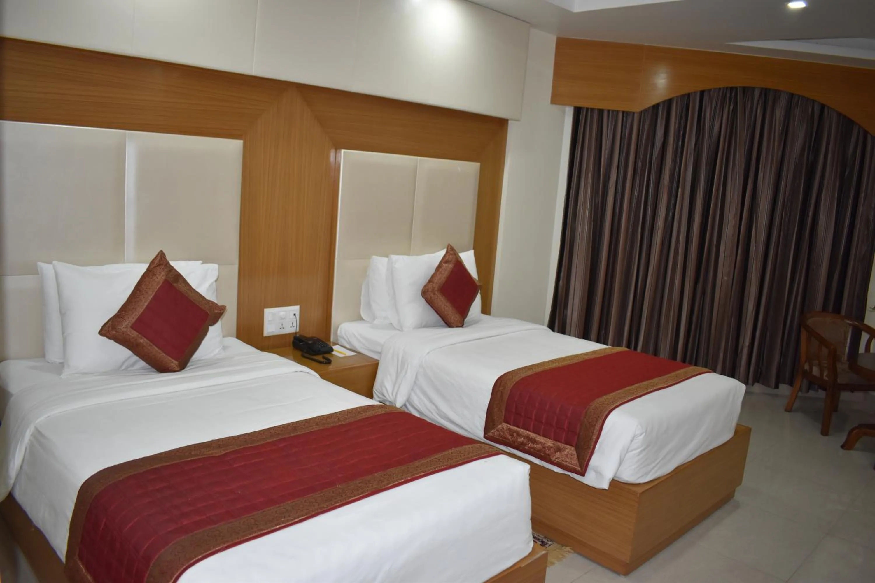 Bed in HOTEL ANAND INTERNATIONAL