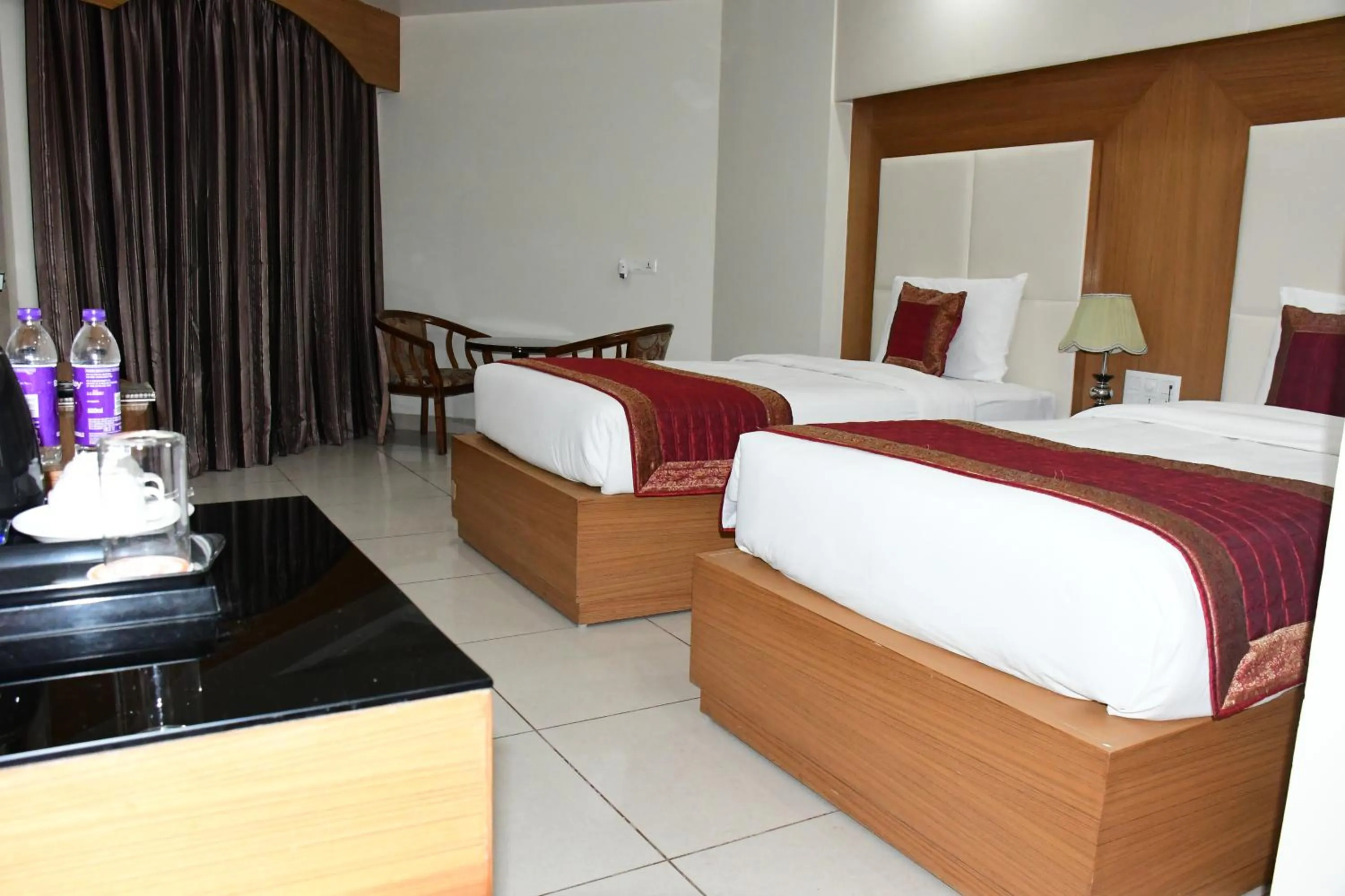 Bed in HOTEL ANAND INTERNATIONAL