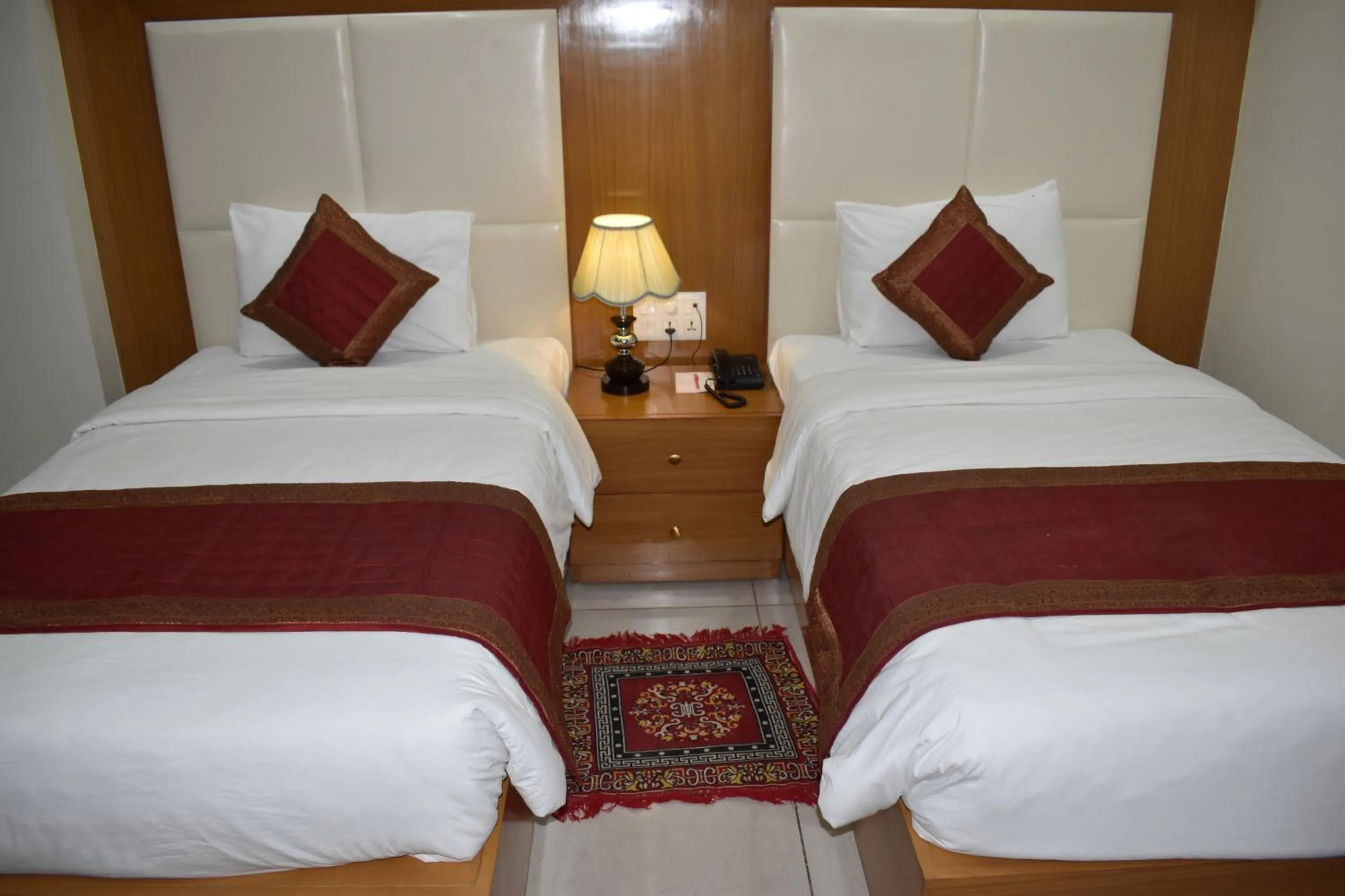 Bed in HOTEL ANAND INTERNATIONAL