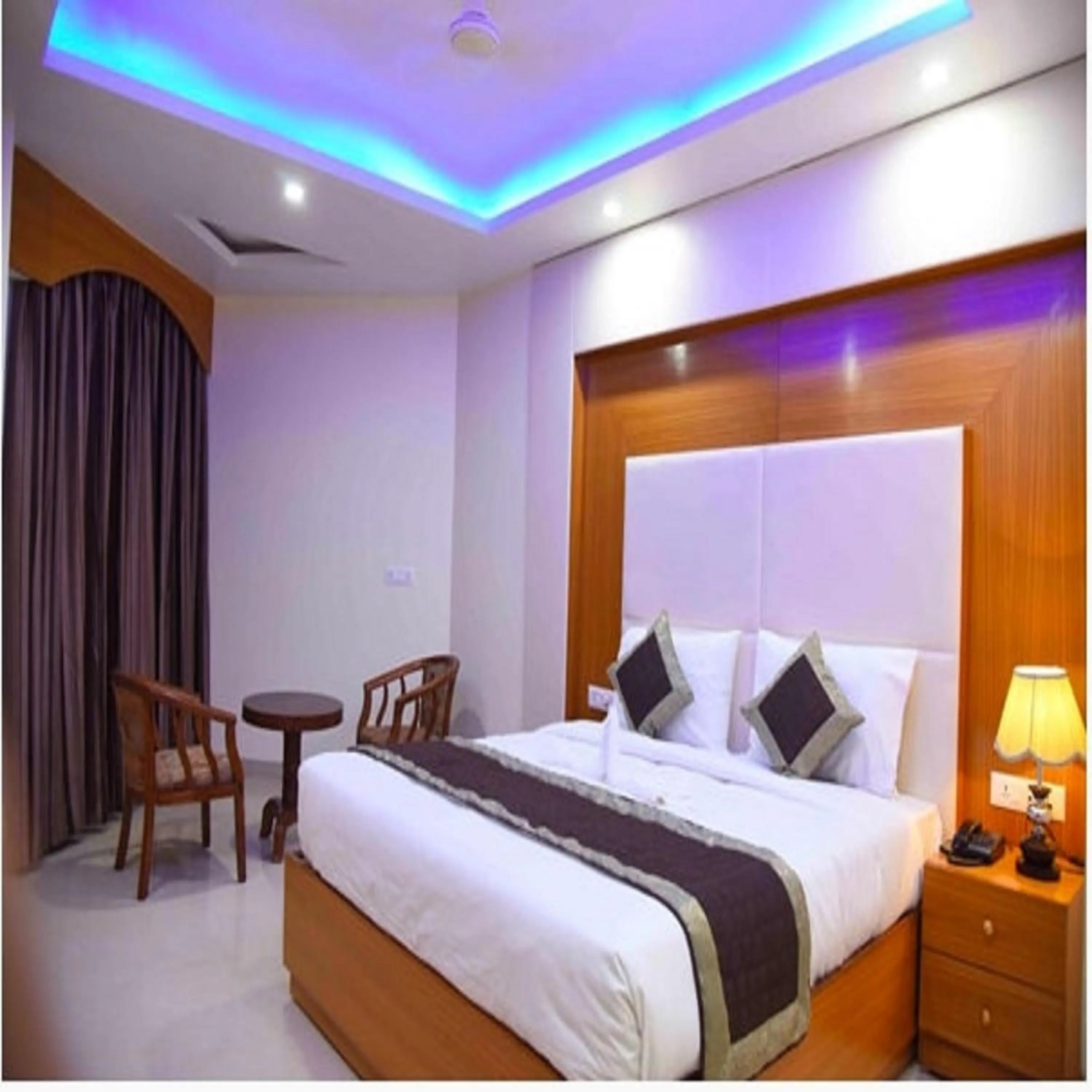 Bed in HOTEL ANAND INTERNATIONAL