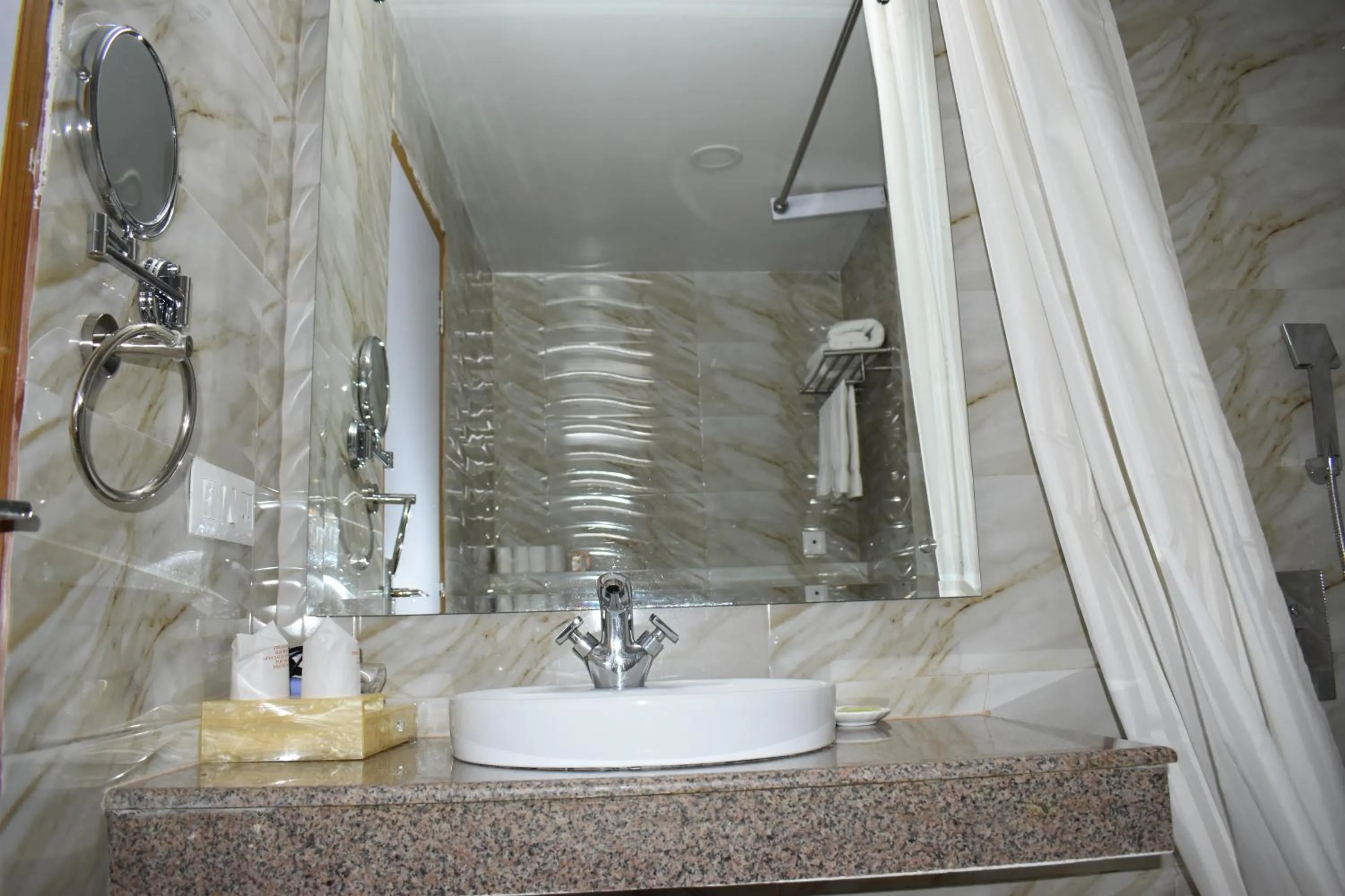Bathroom in HOTEL ANAND INTERNATIONAL