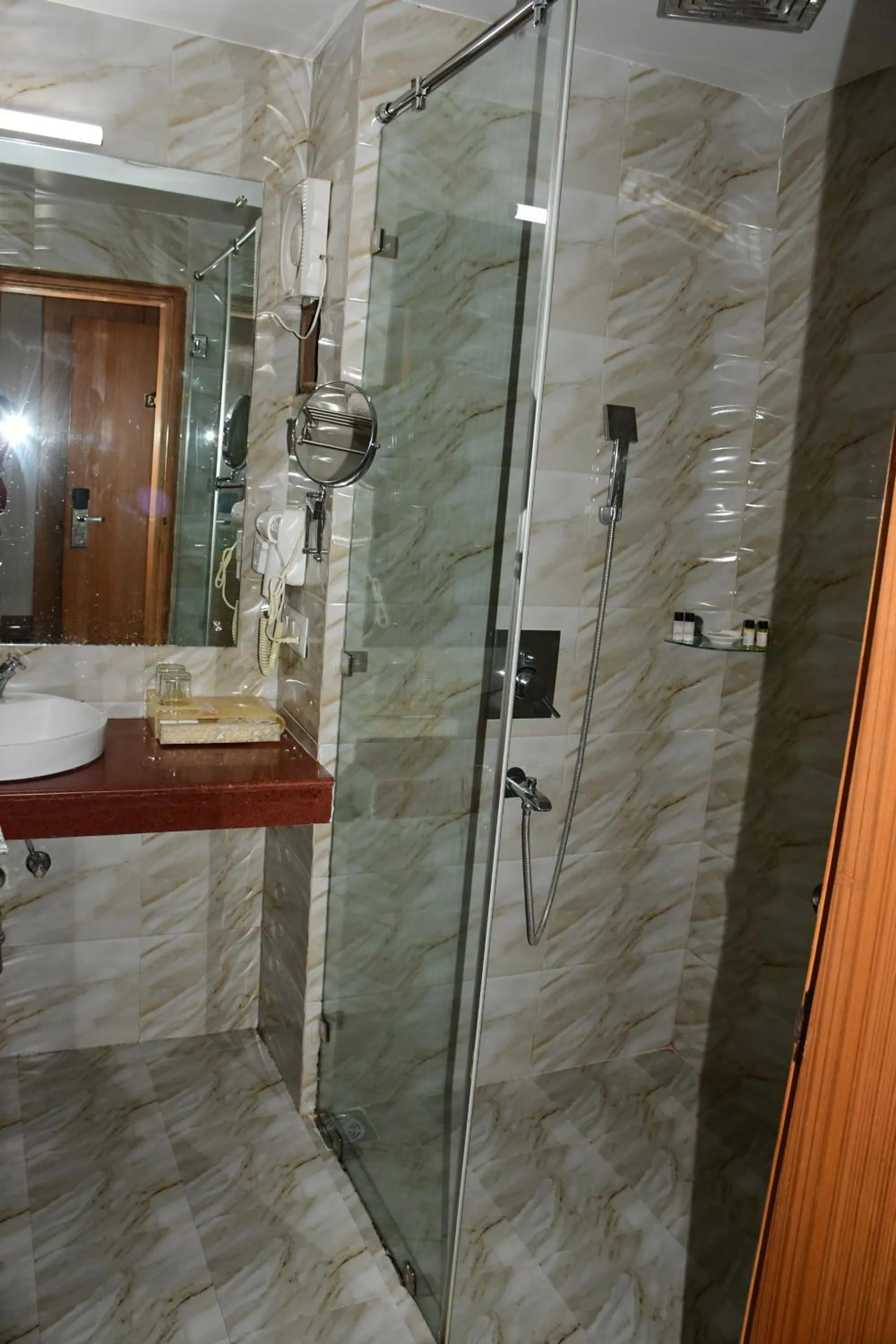 Shower in HOTEL ANAND INTERNATIONAL