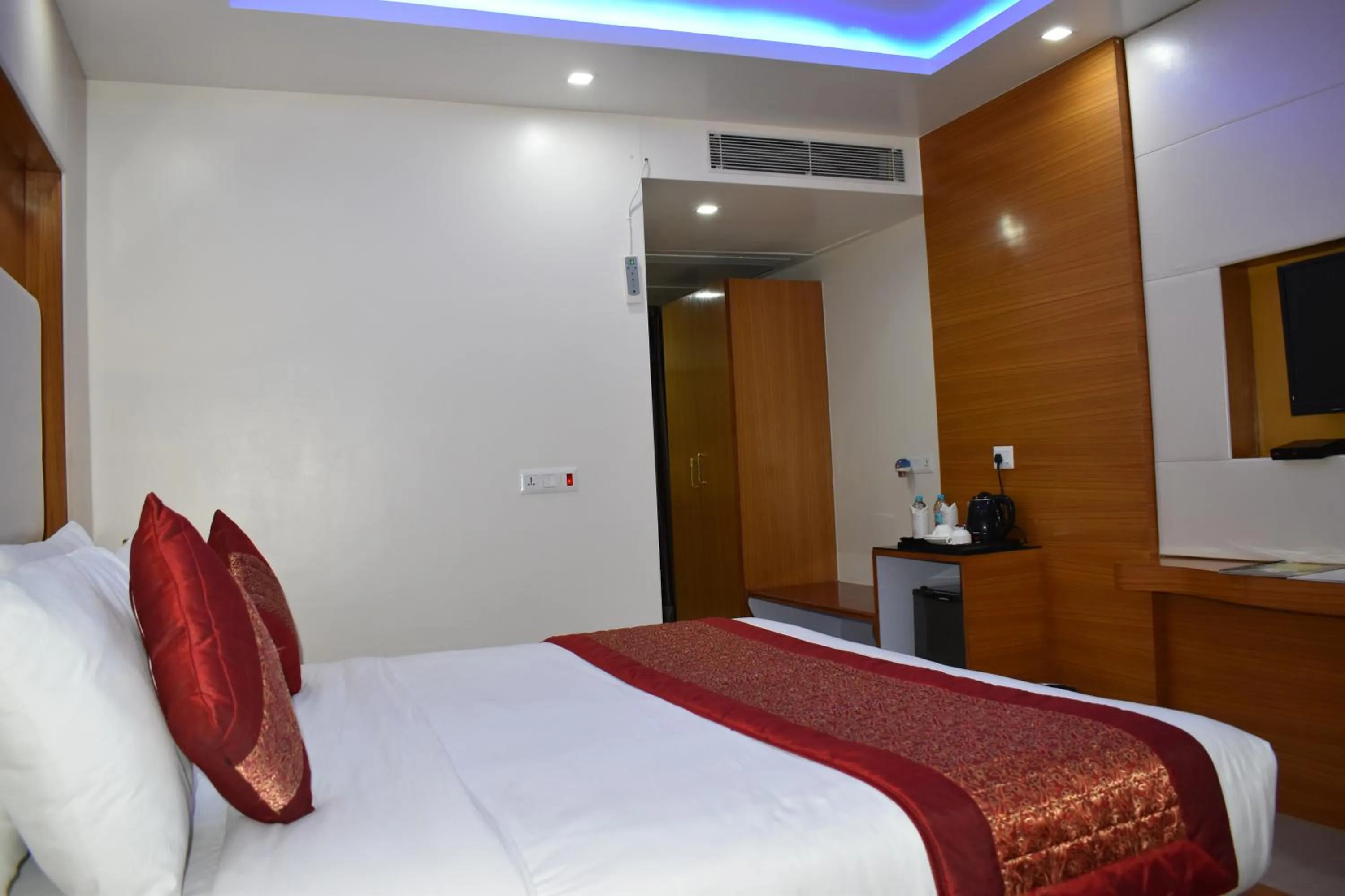 Bed in HOTEL ANAND INTERNATIONAL