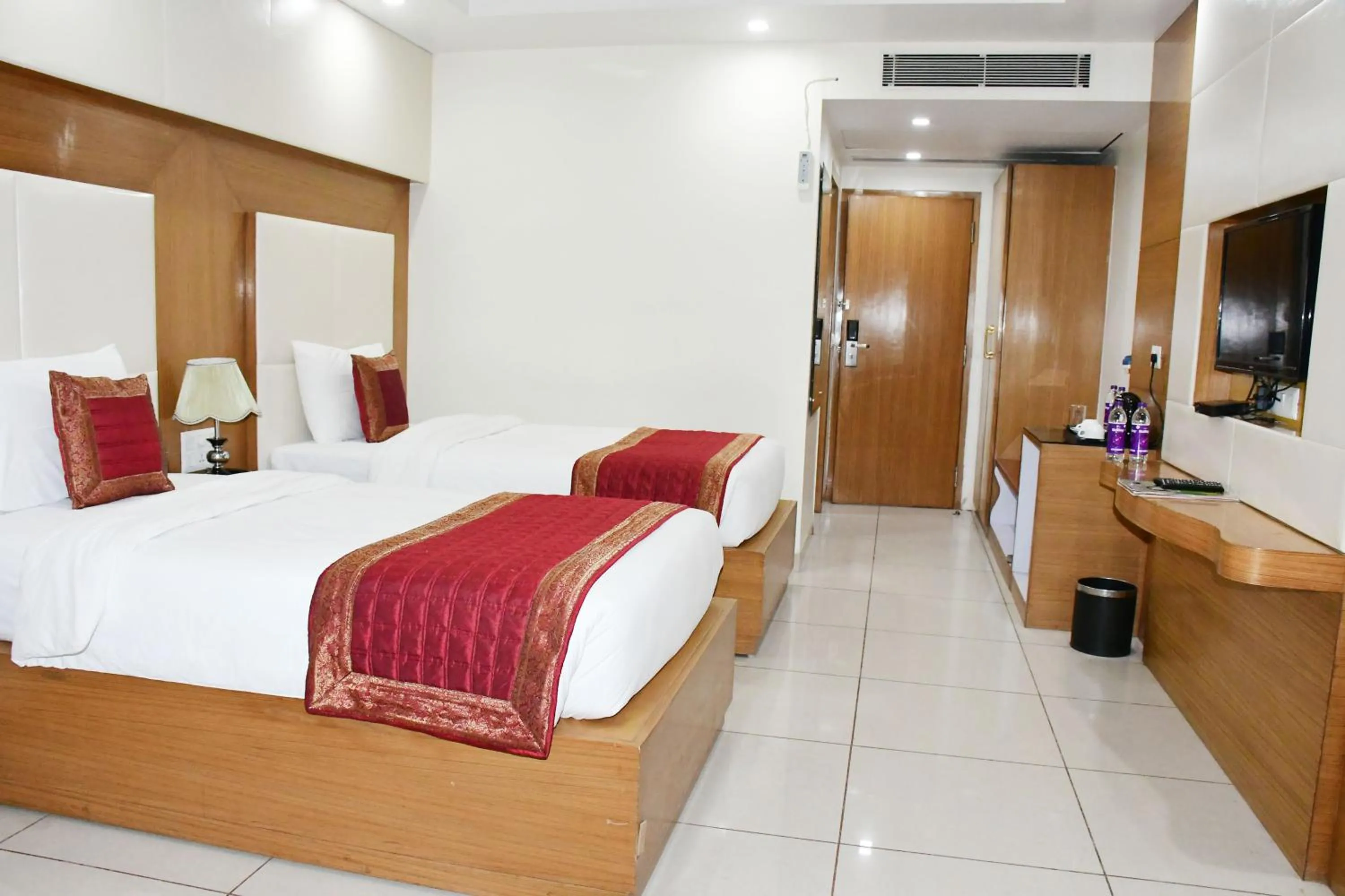 Bed in HOTEL ANAND INTERNATIONAL