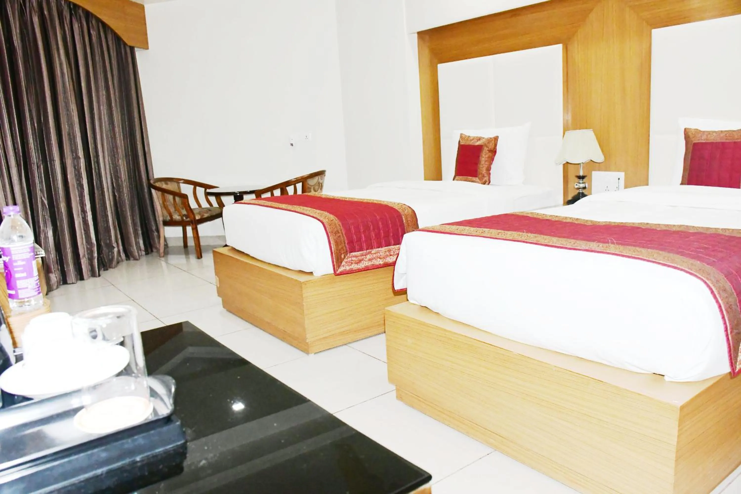 Bed in HOTEL ANAND INTERNATIONAL