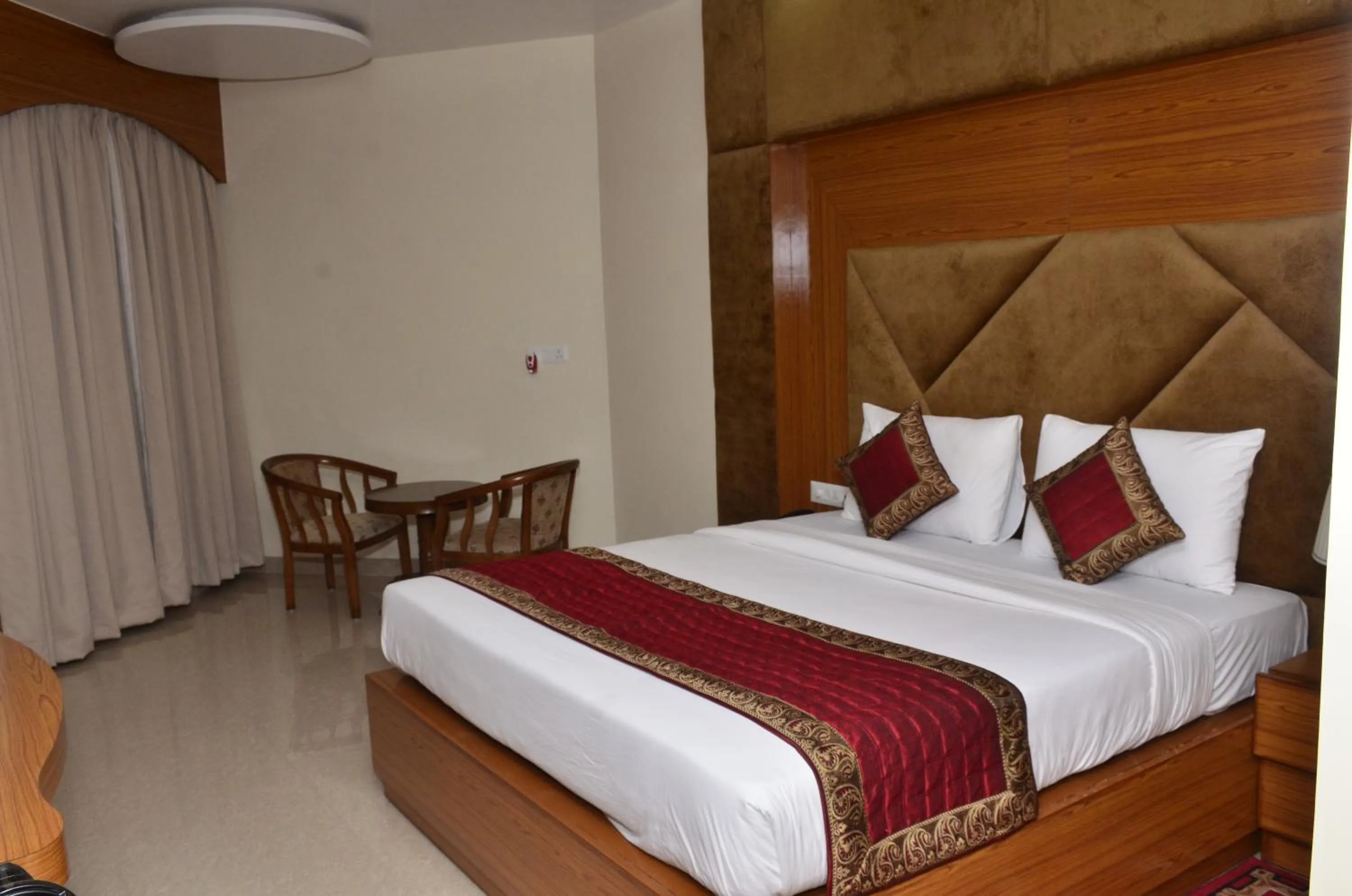 Bed in HOTEL ANAND INTERNATIONAL