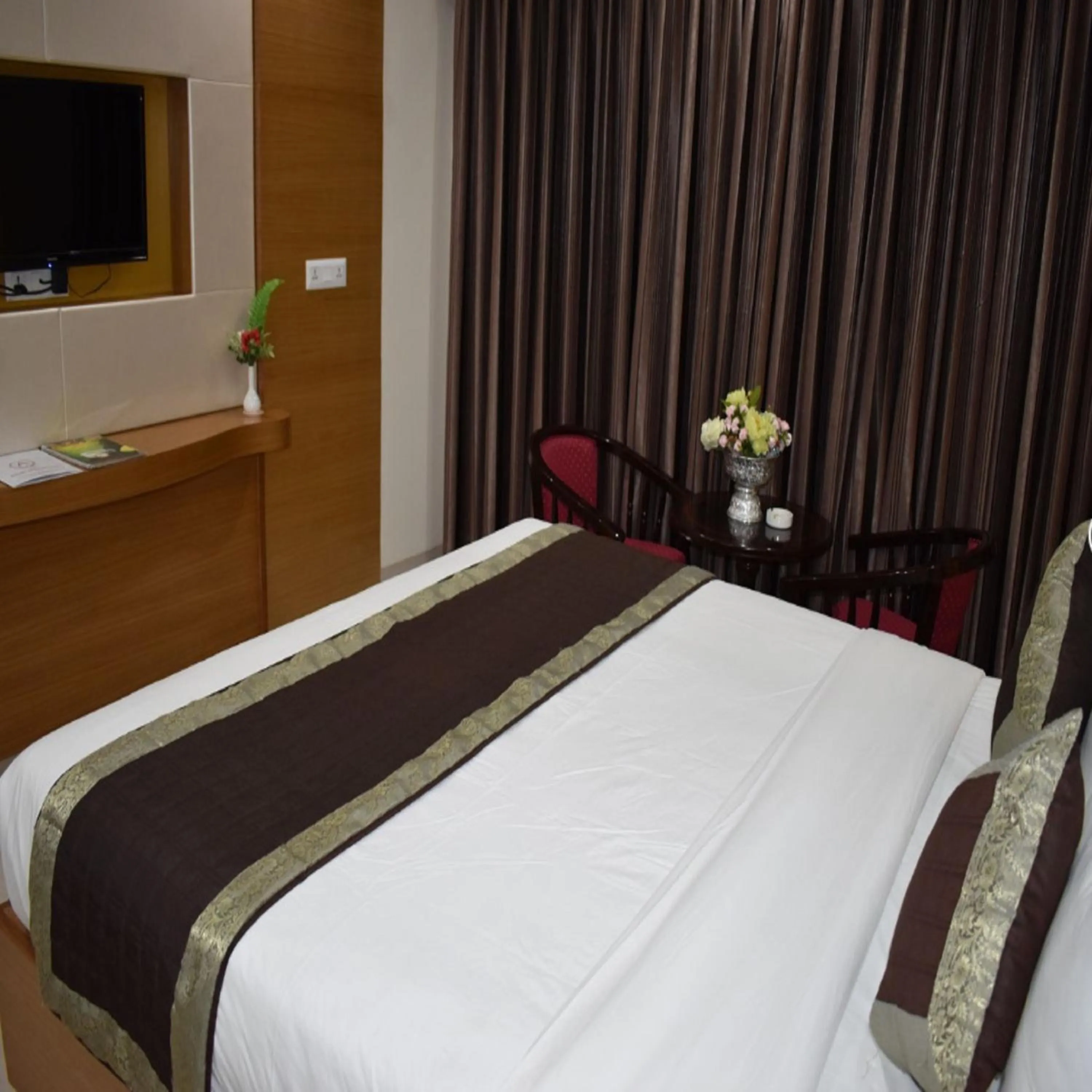Bed in HOTEL ANAND INTERNATIONAL