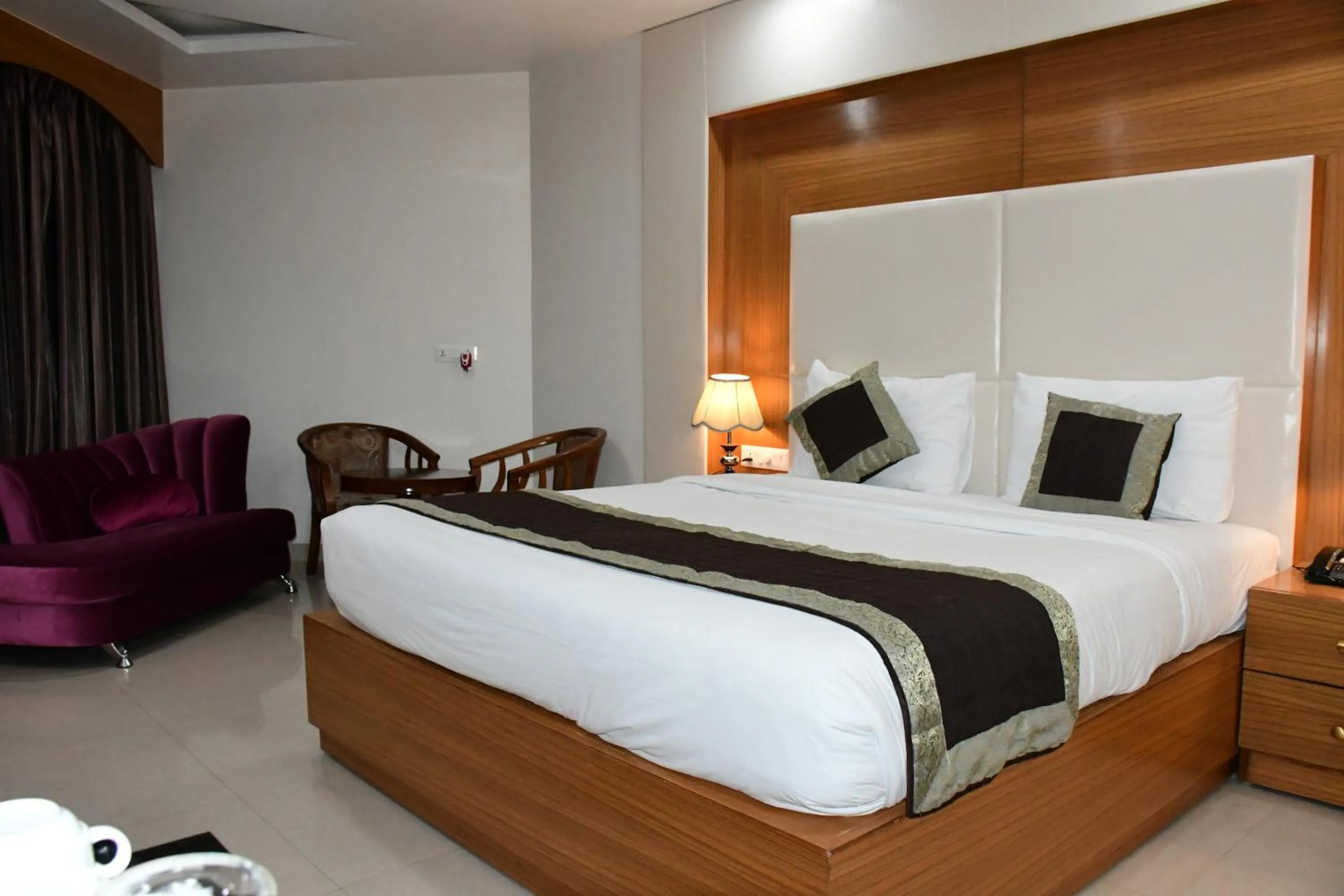 Bed in HOTEL ANAND INTERNATIONAL