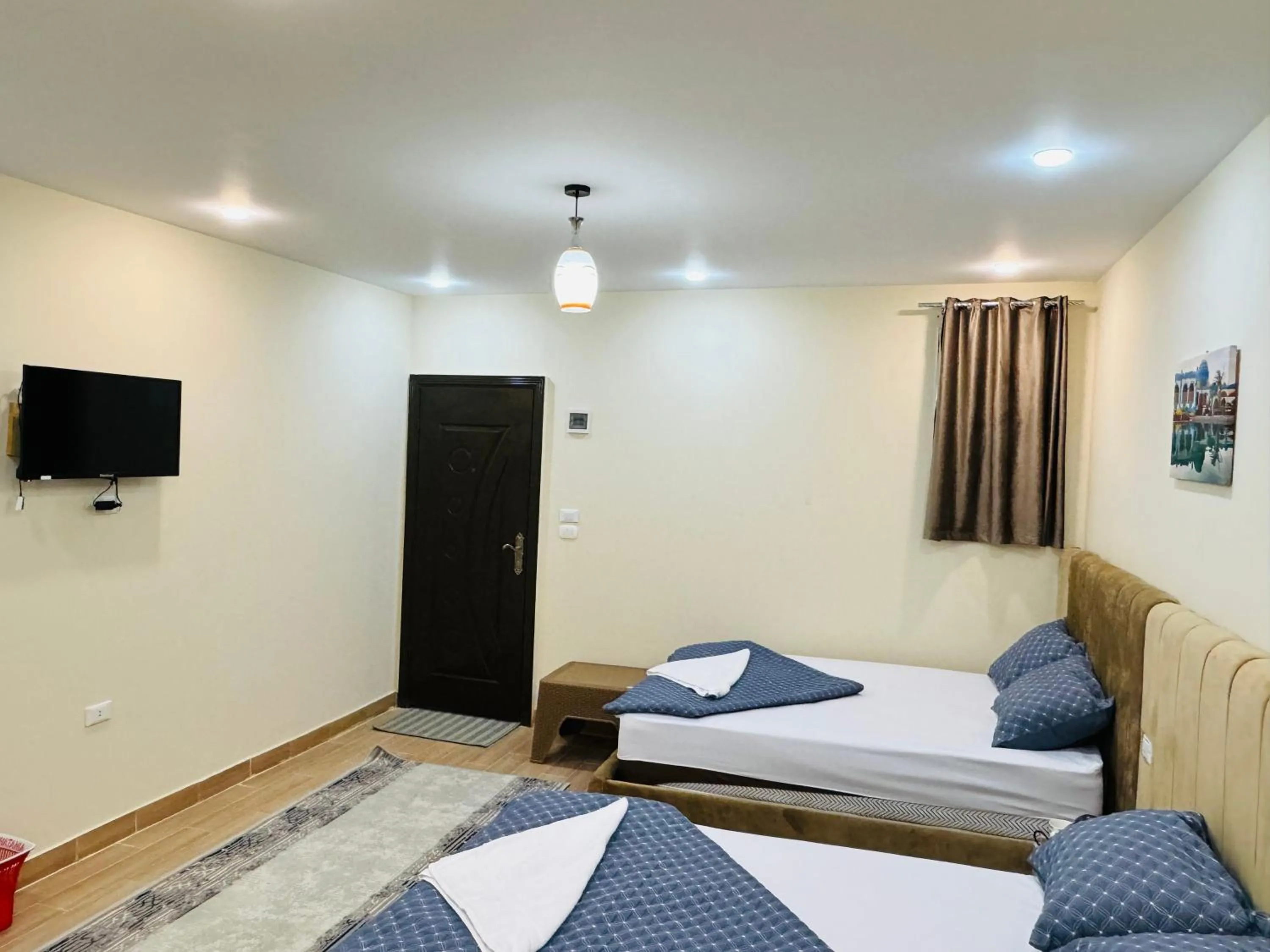 Bed in Sphinx palace pyramids view inn