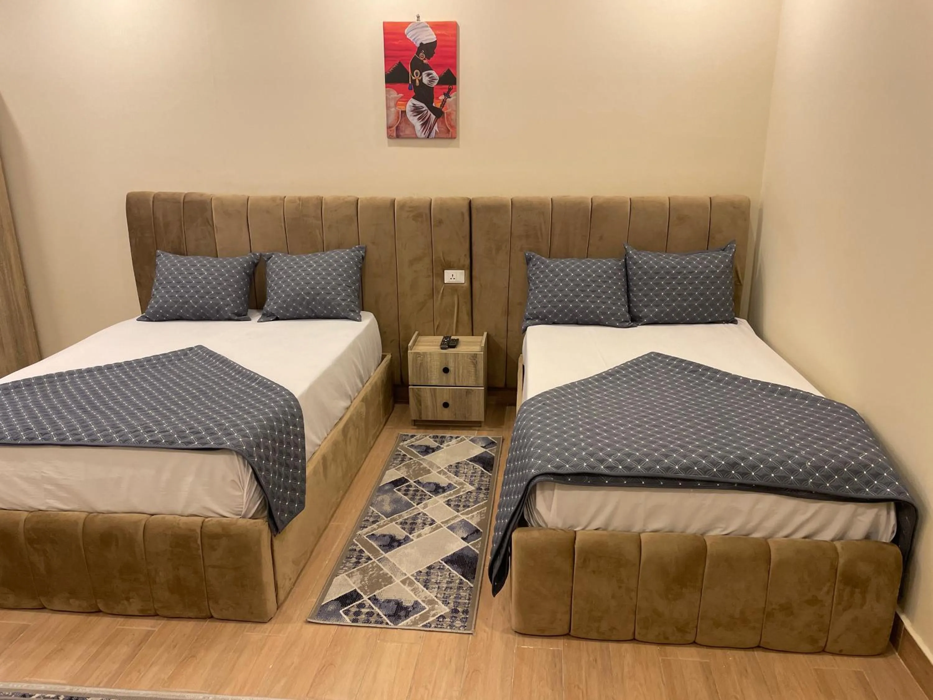 Bed in Sphinx palace pyramids view inn