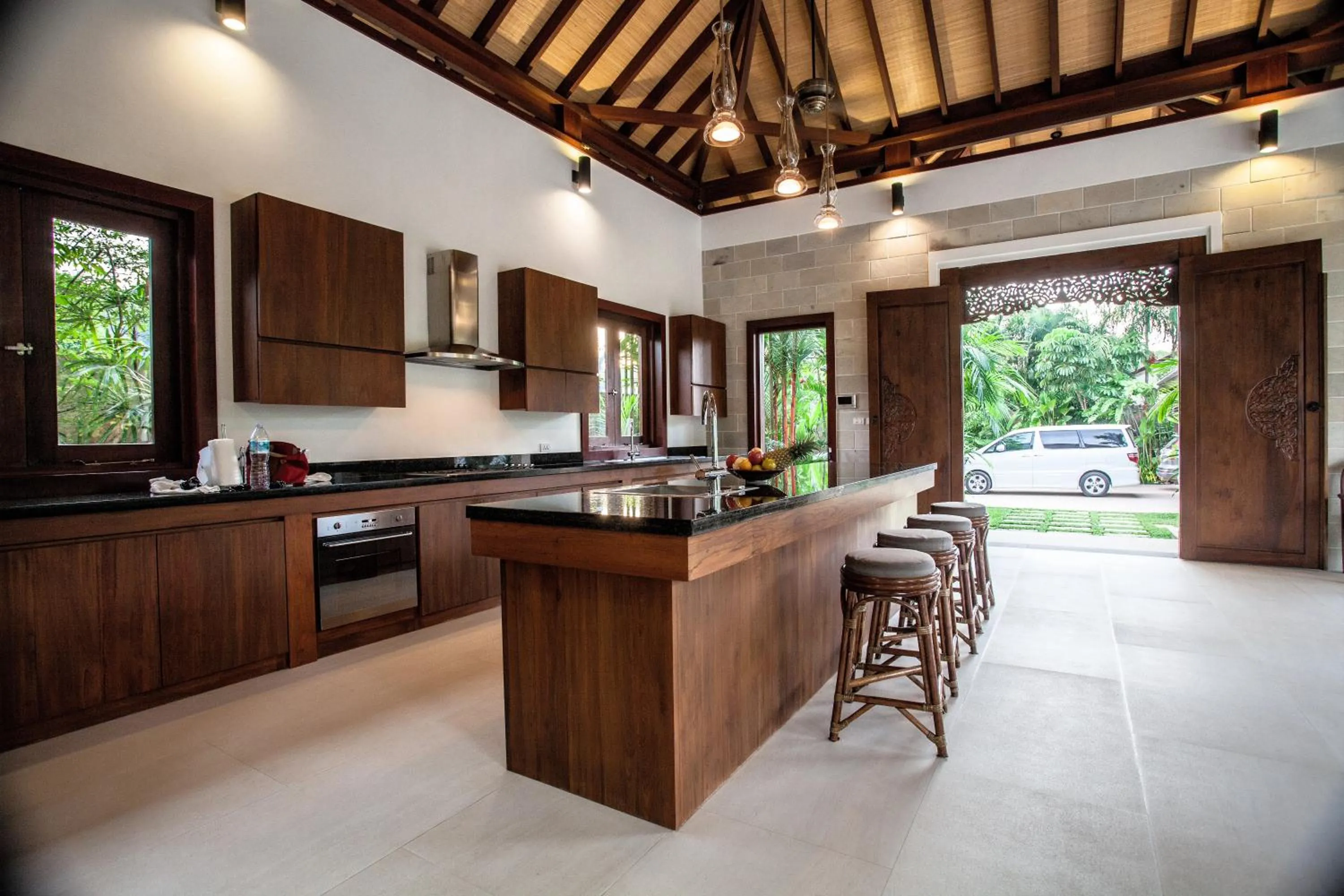Kitchen or kitchenette in Baan Pinya Balinese Style Pool Villa