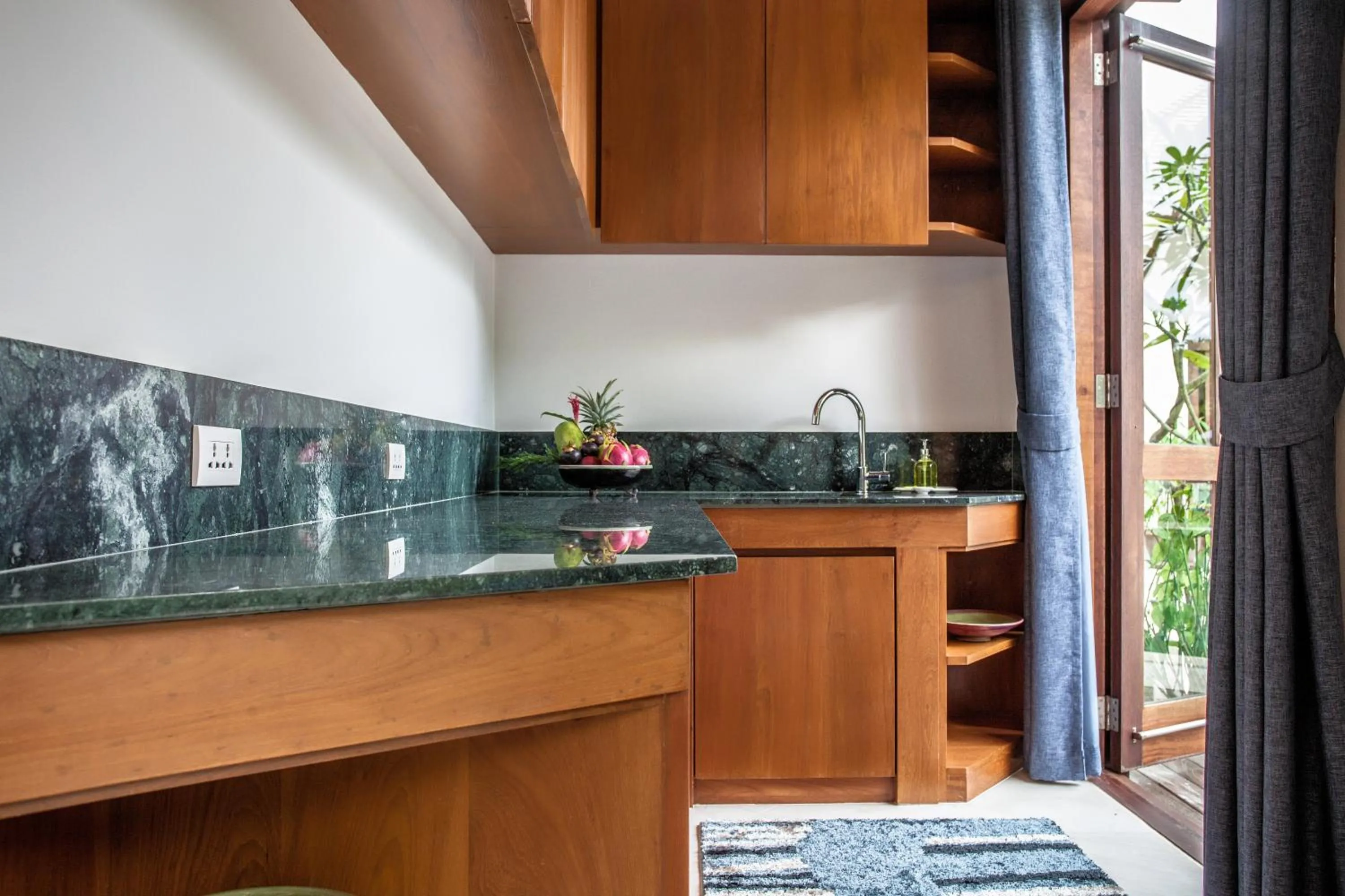 Kitchen or kitchenette in Baan Pinya Balinese Style Pool Villa
