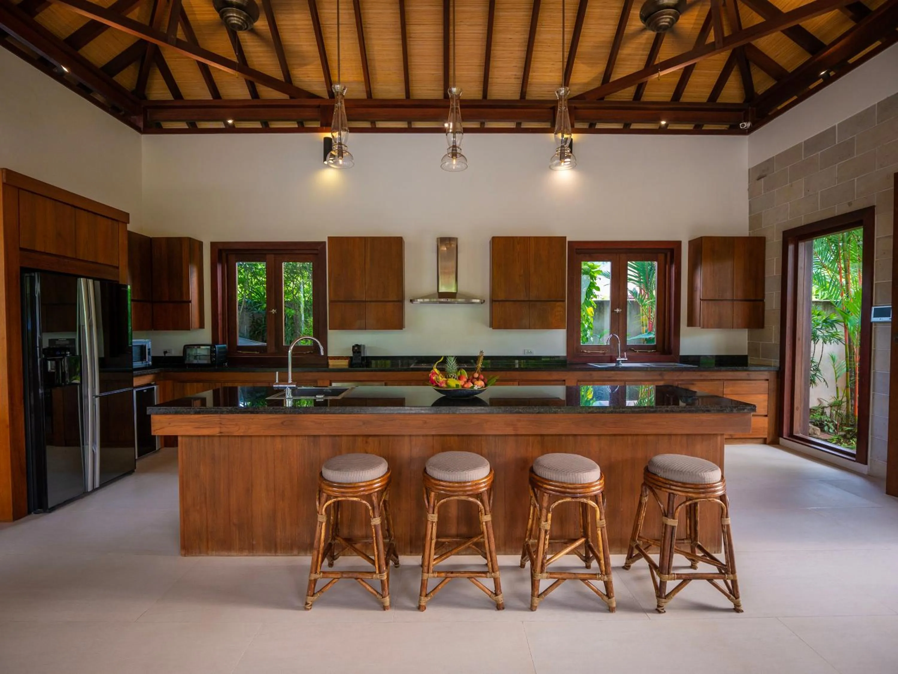 Kitchen or kitchenette in Baan Pinya Balinese Style Pool Villa
