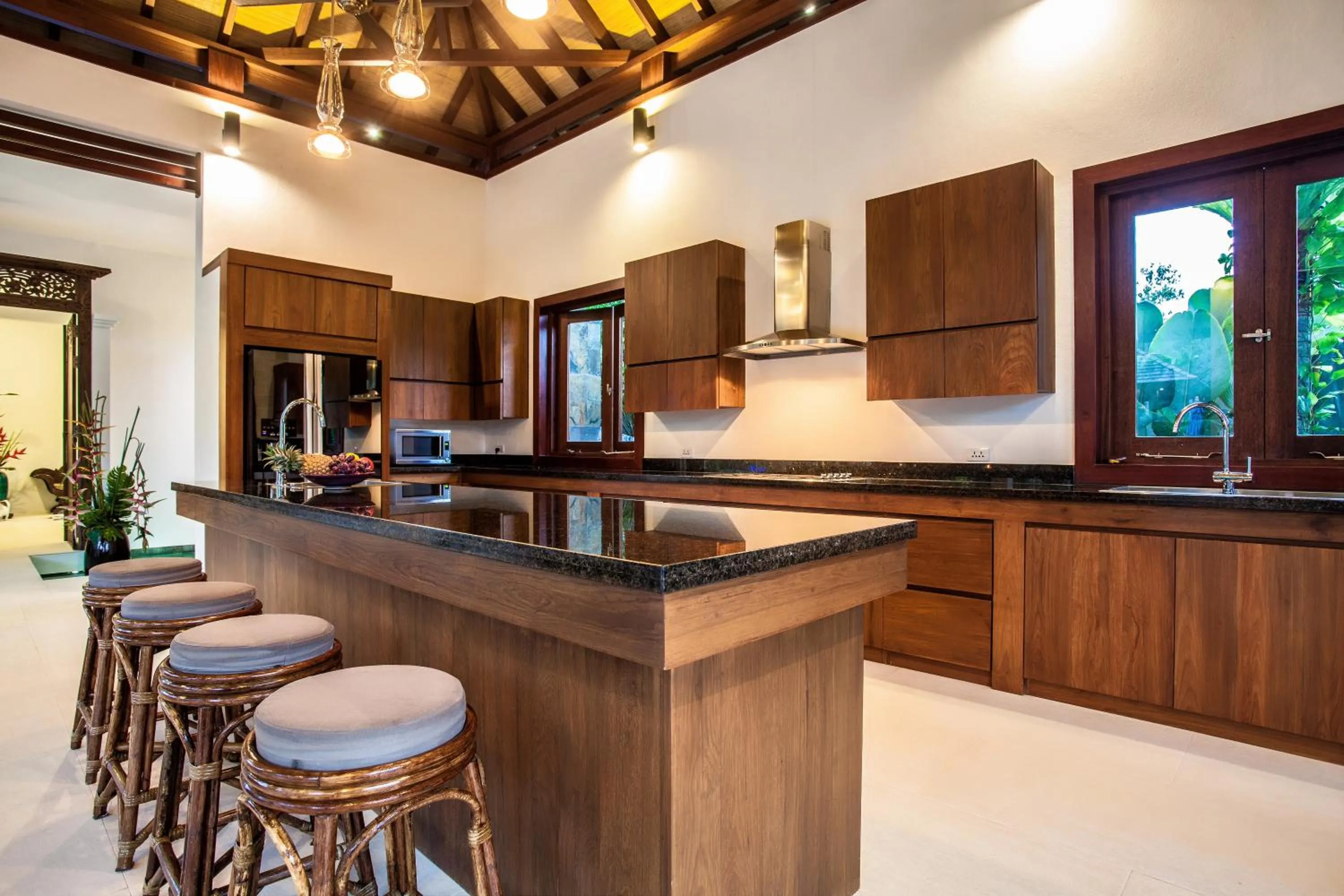 Kitchen or kitchenette in Baan Pinya Balinese Style Pool Villa