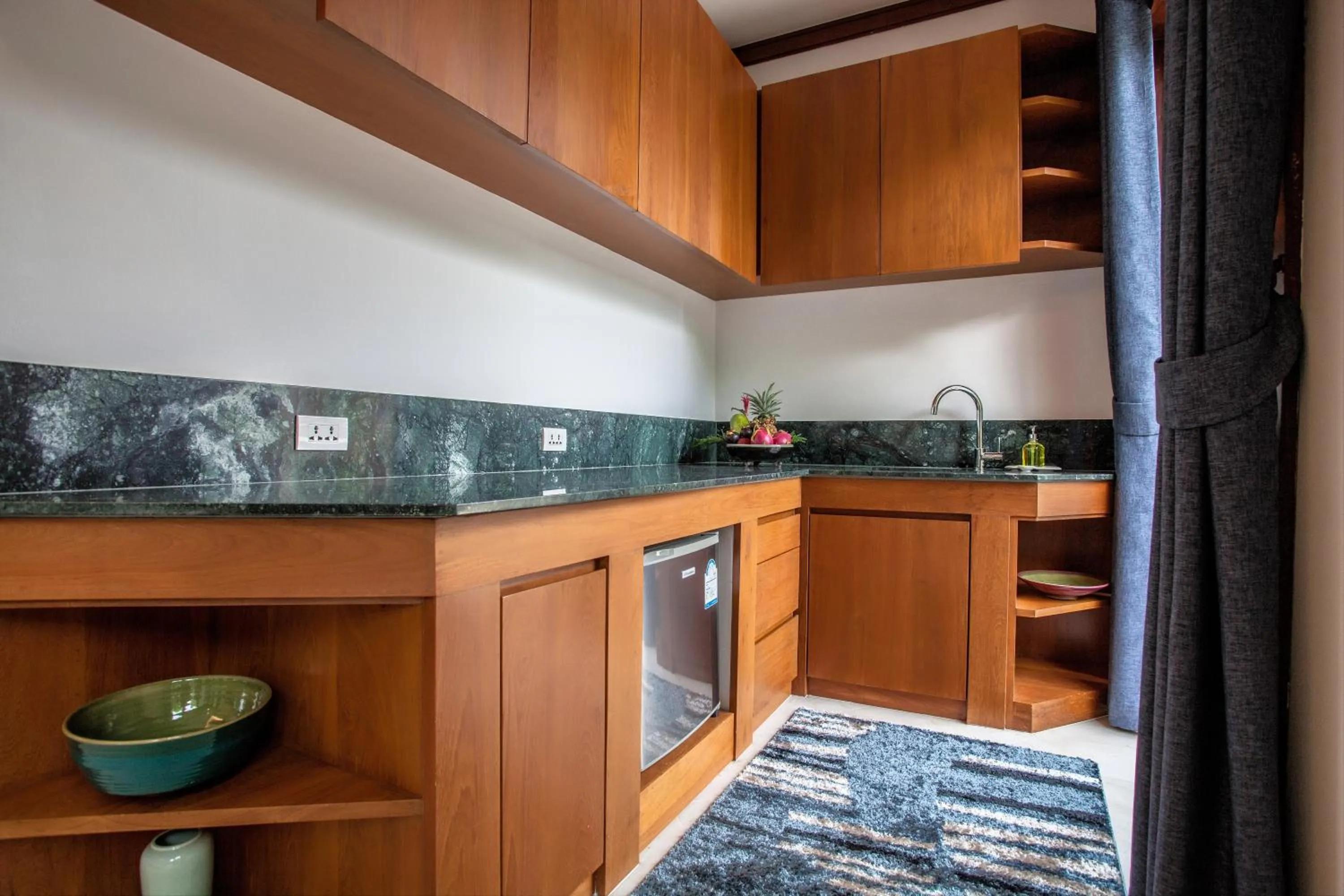 Kitchen or kitchenette in Baan Pinya Balinese Style Pool Villa