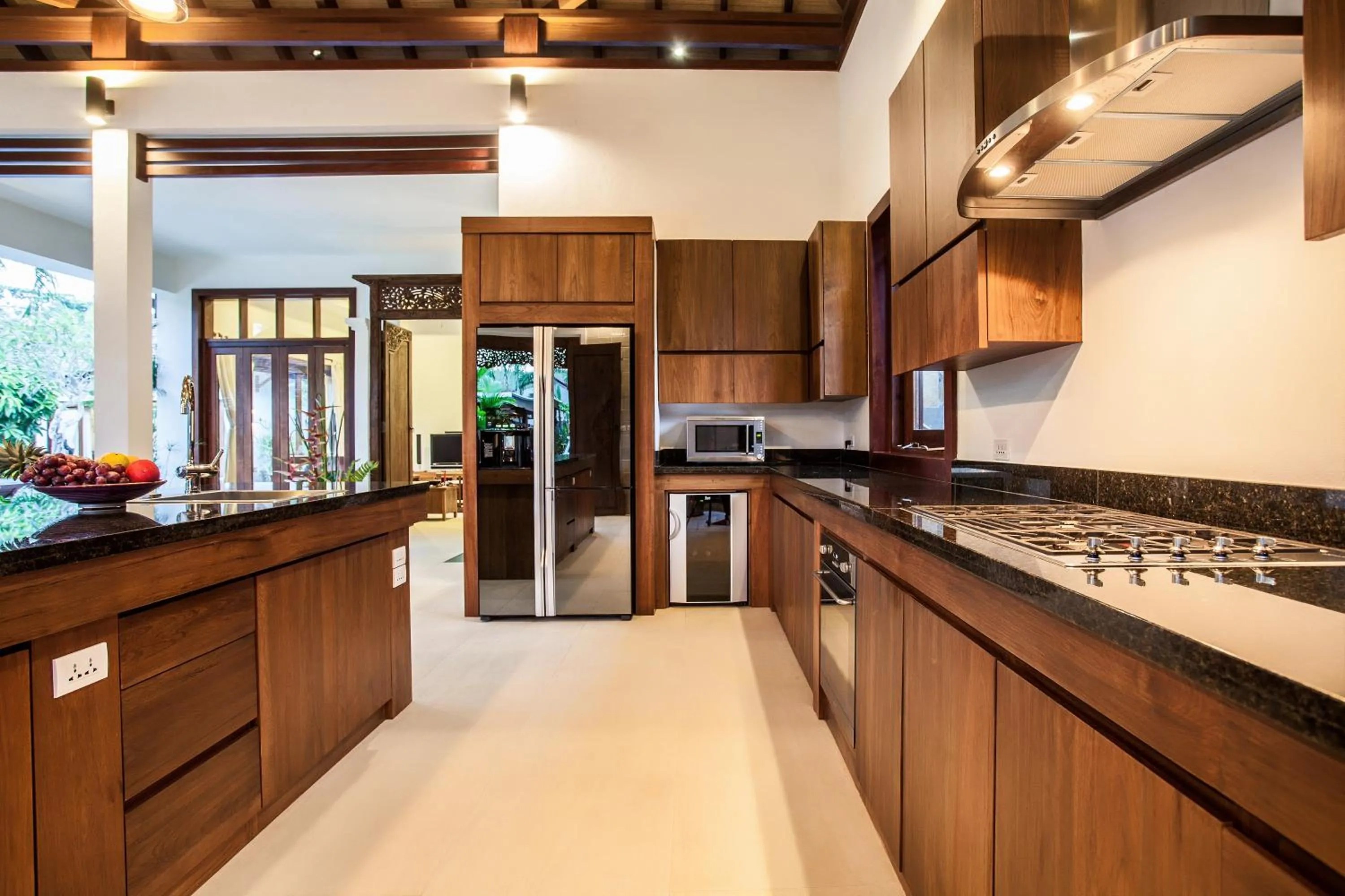 Kitchen or kitchenette in Baan Pinya Balinese Style Pool Villa