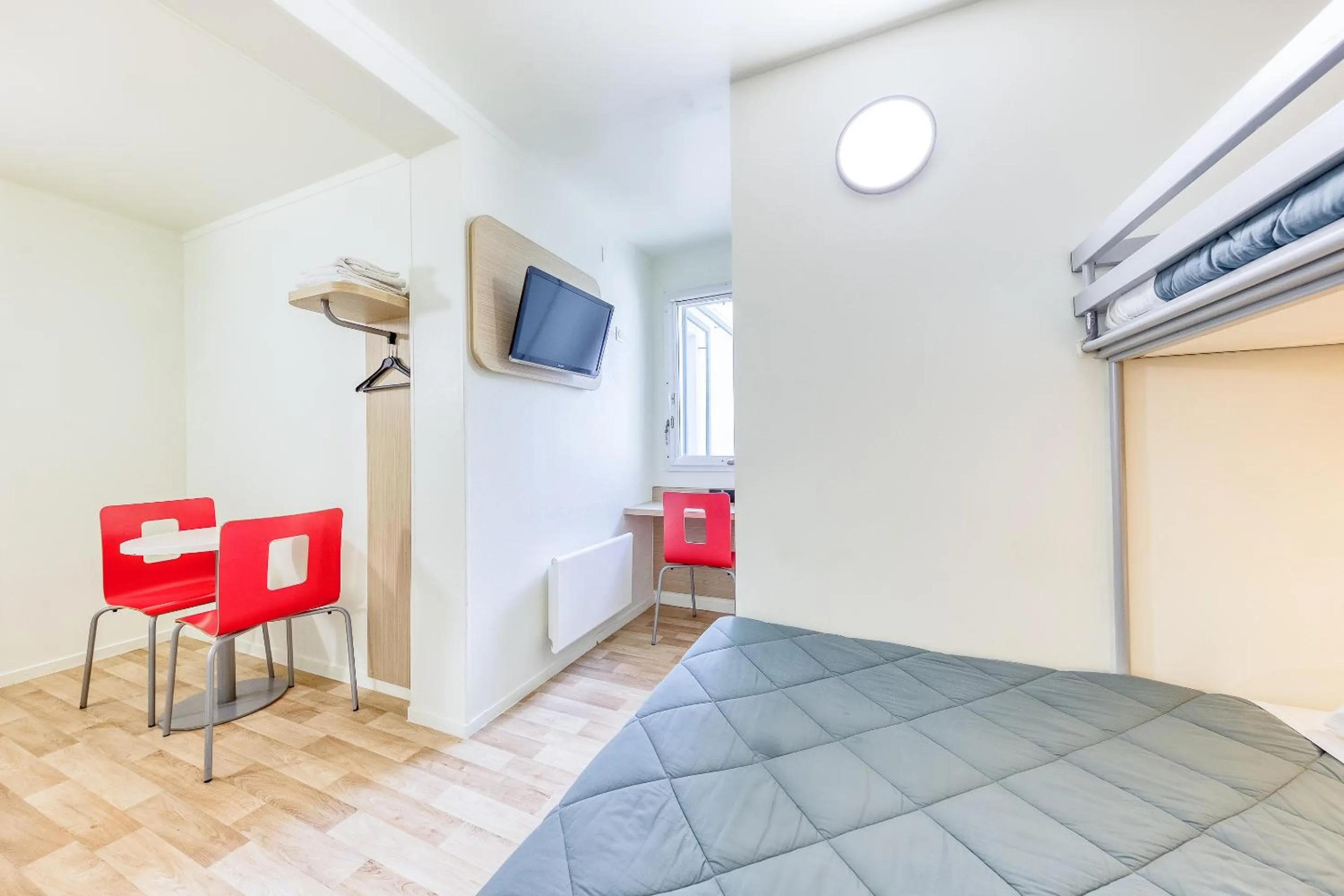 Bedroom in Premiere Classe Cergy Saint Christophe