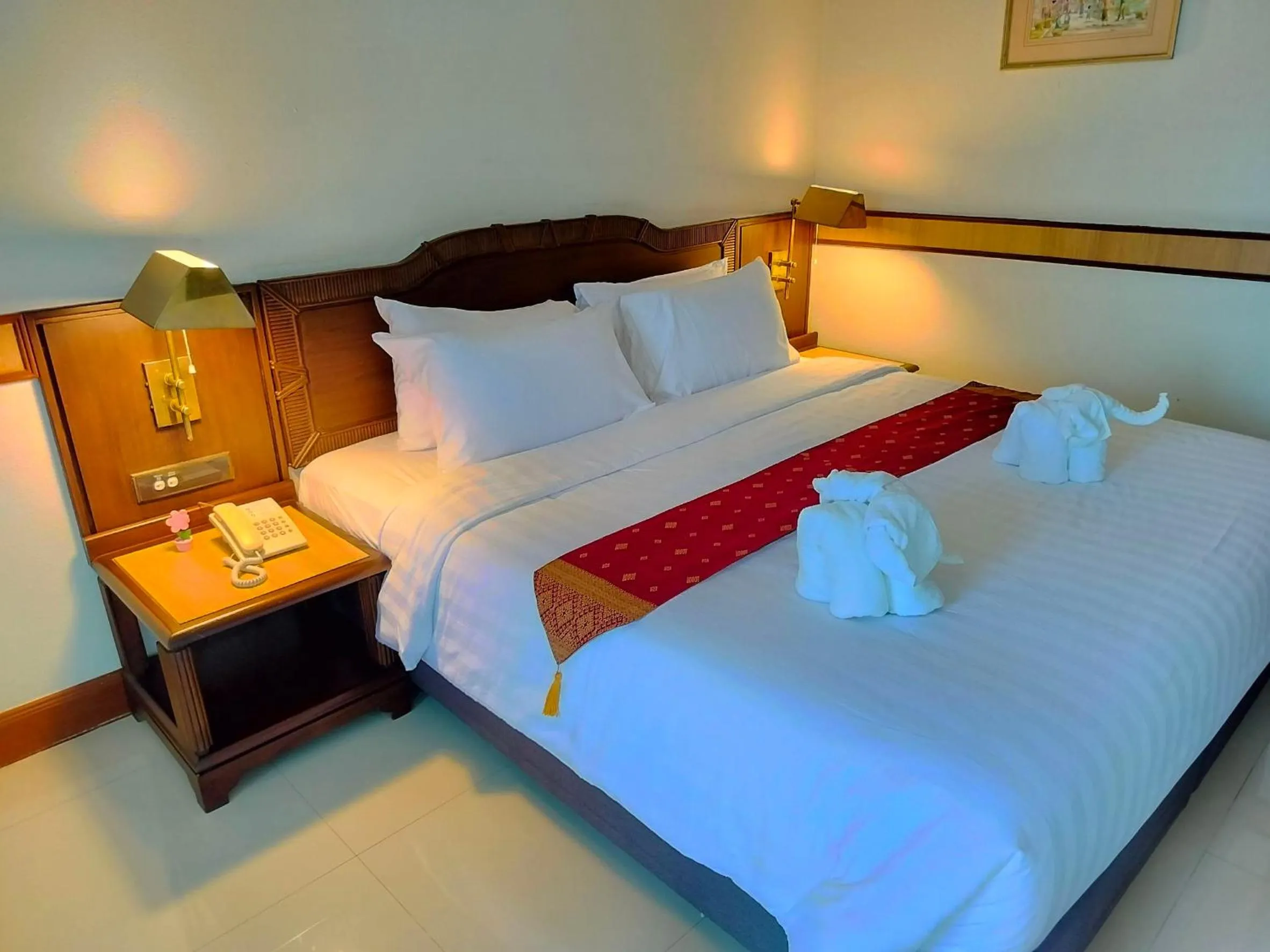 Bed in Suntara Wellness Resort & Hotel