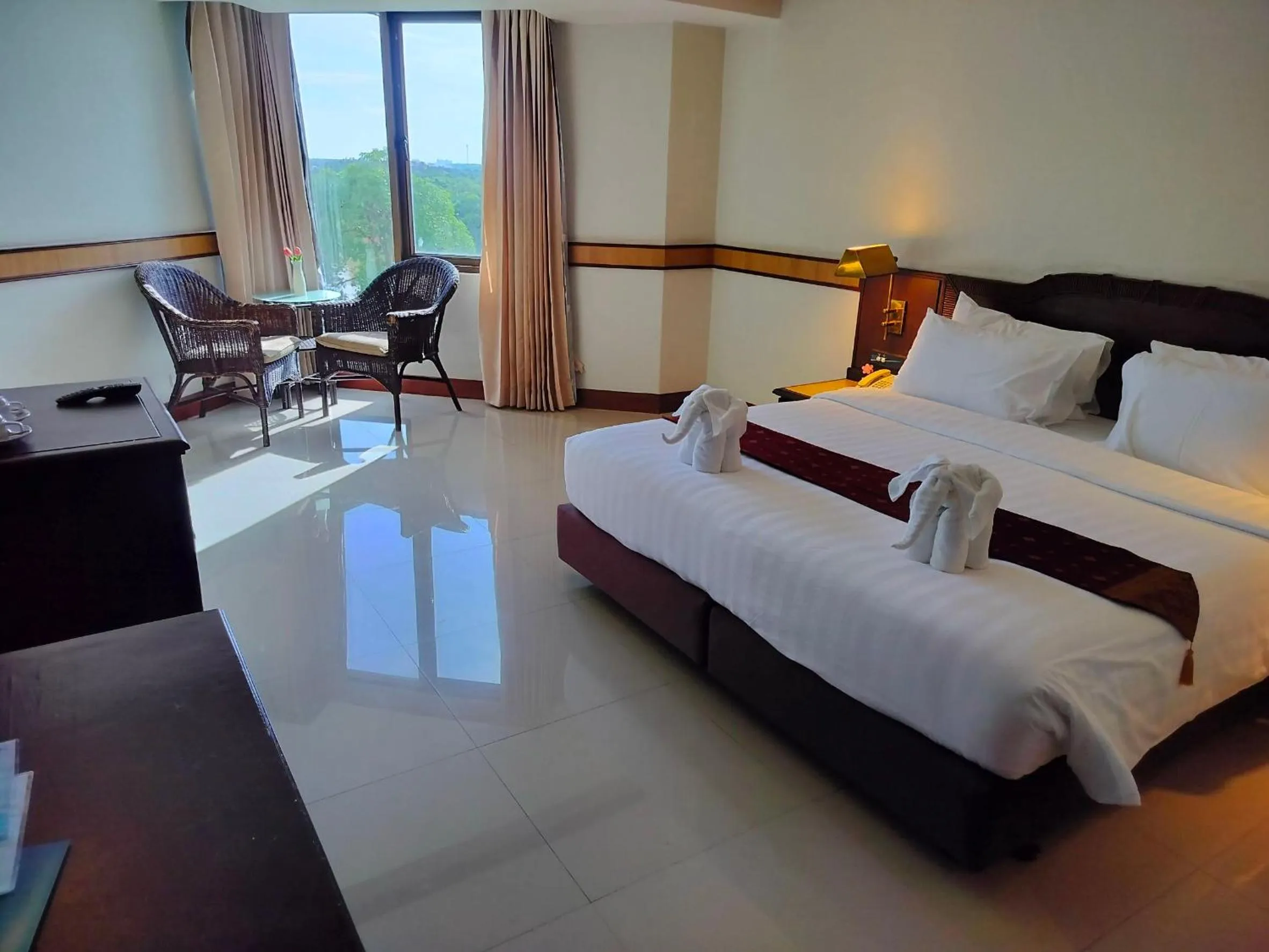 Bed in Suntara Wellness Resort & Hotel