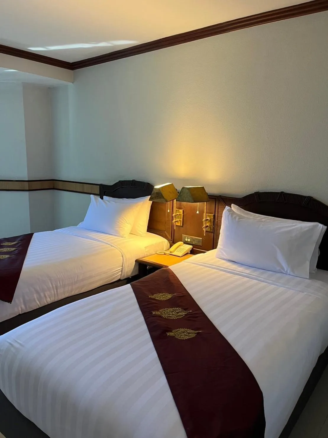 Bed in Suntara Wellness Resort & Hotel