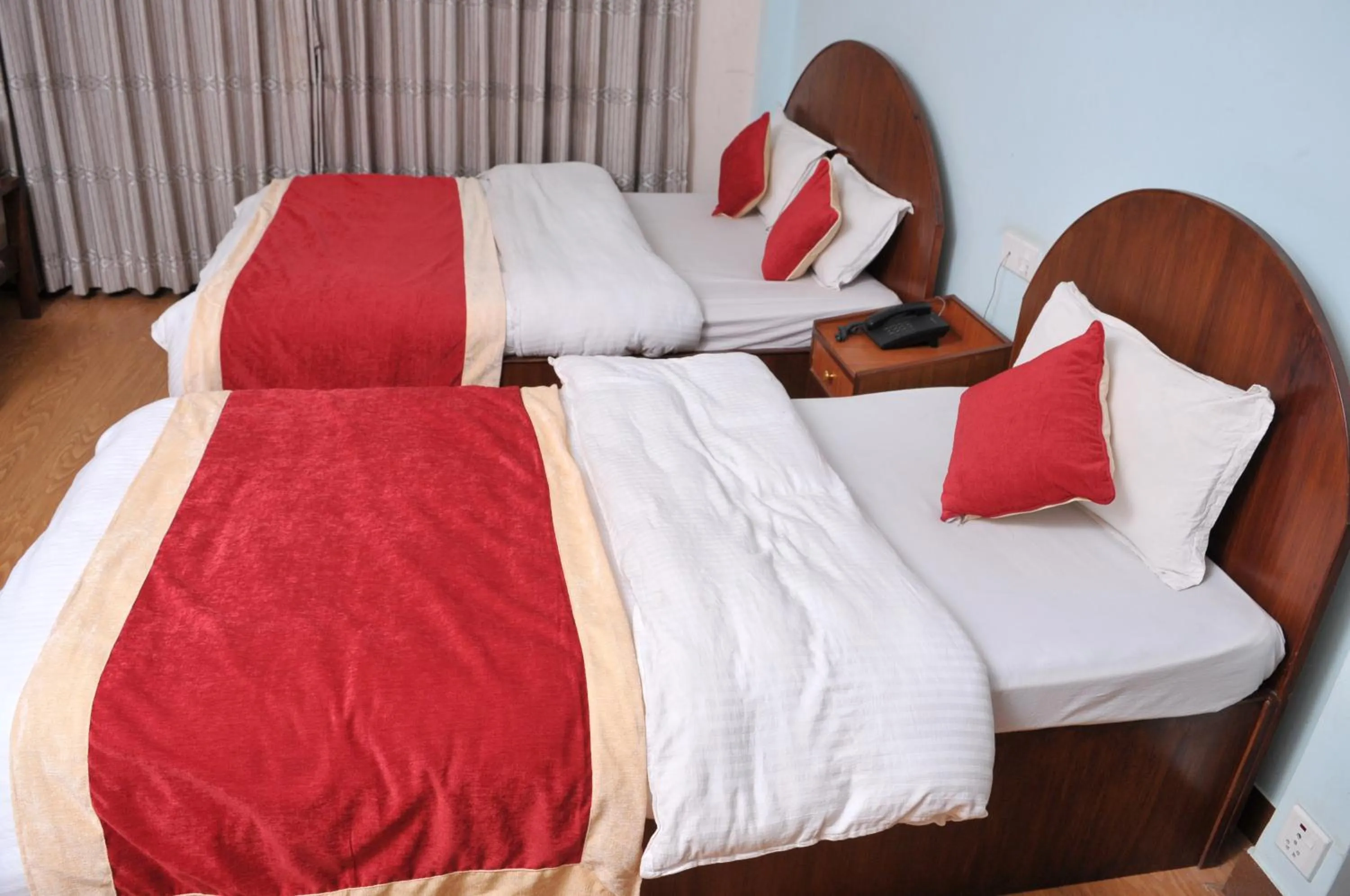 Photo of the whole room, Bed in Hotel Brihaspati