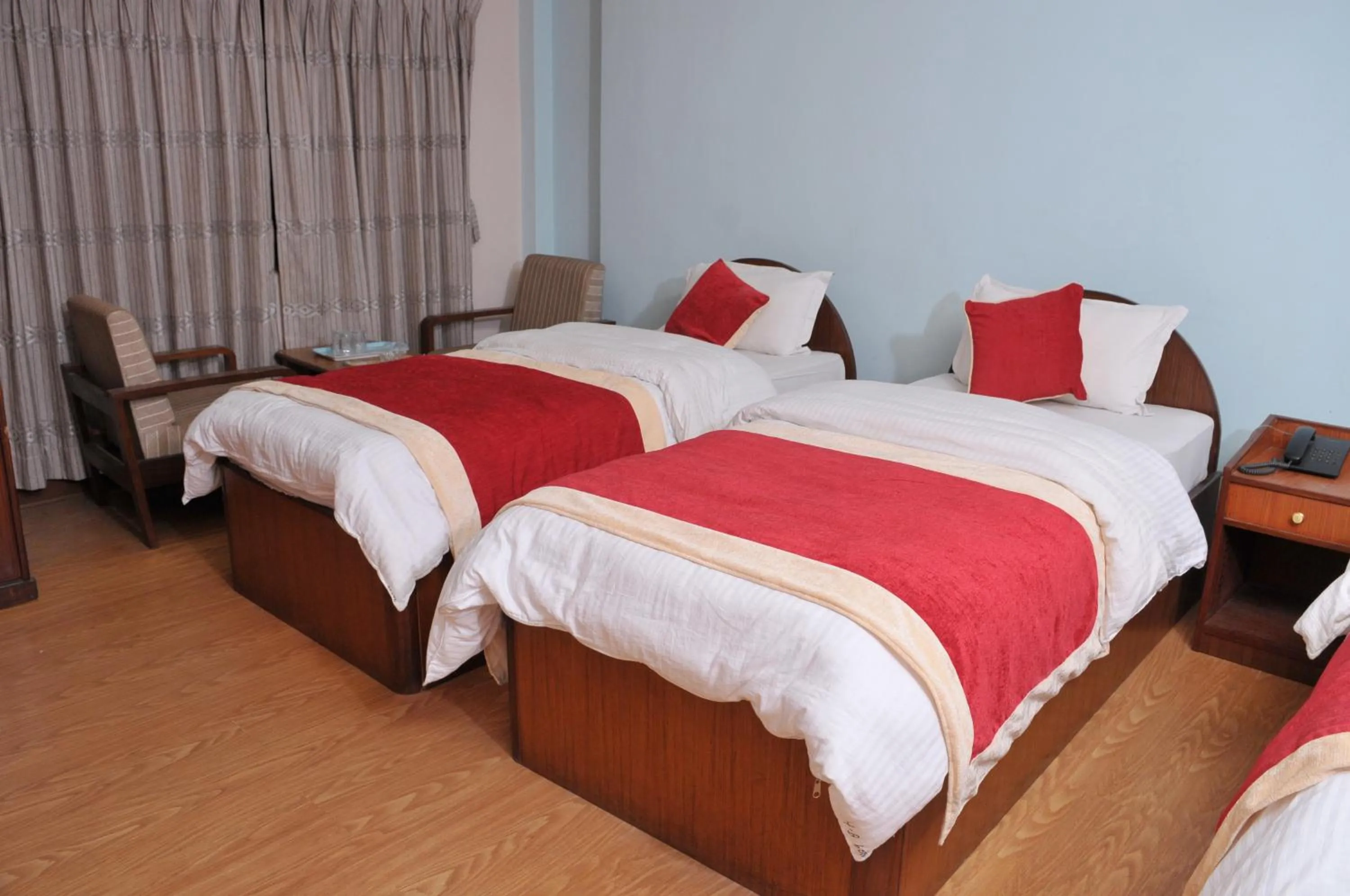 Photo of the whole room, Bed in Hotel Brihaspati