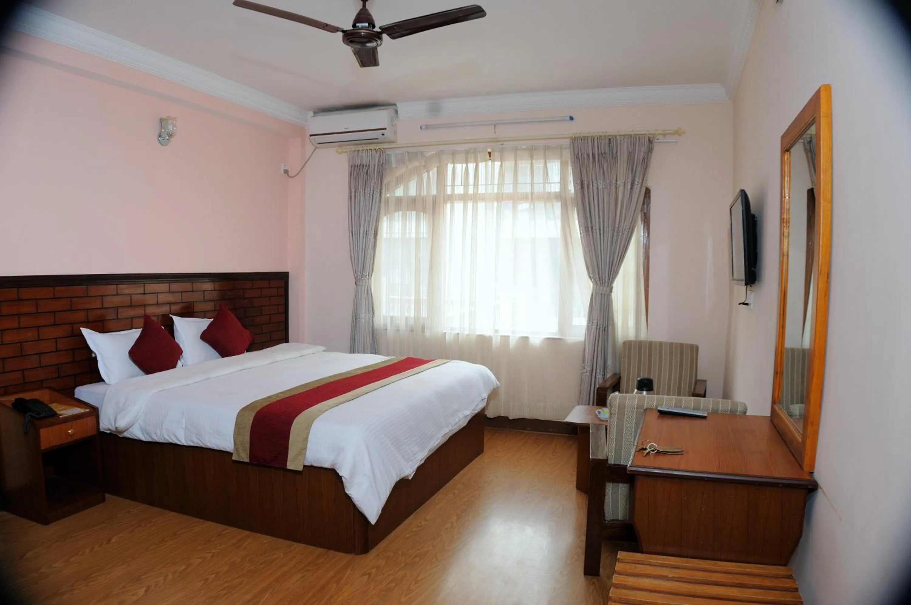 Photo of the whole room, Bed in Hotel Brihaspati