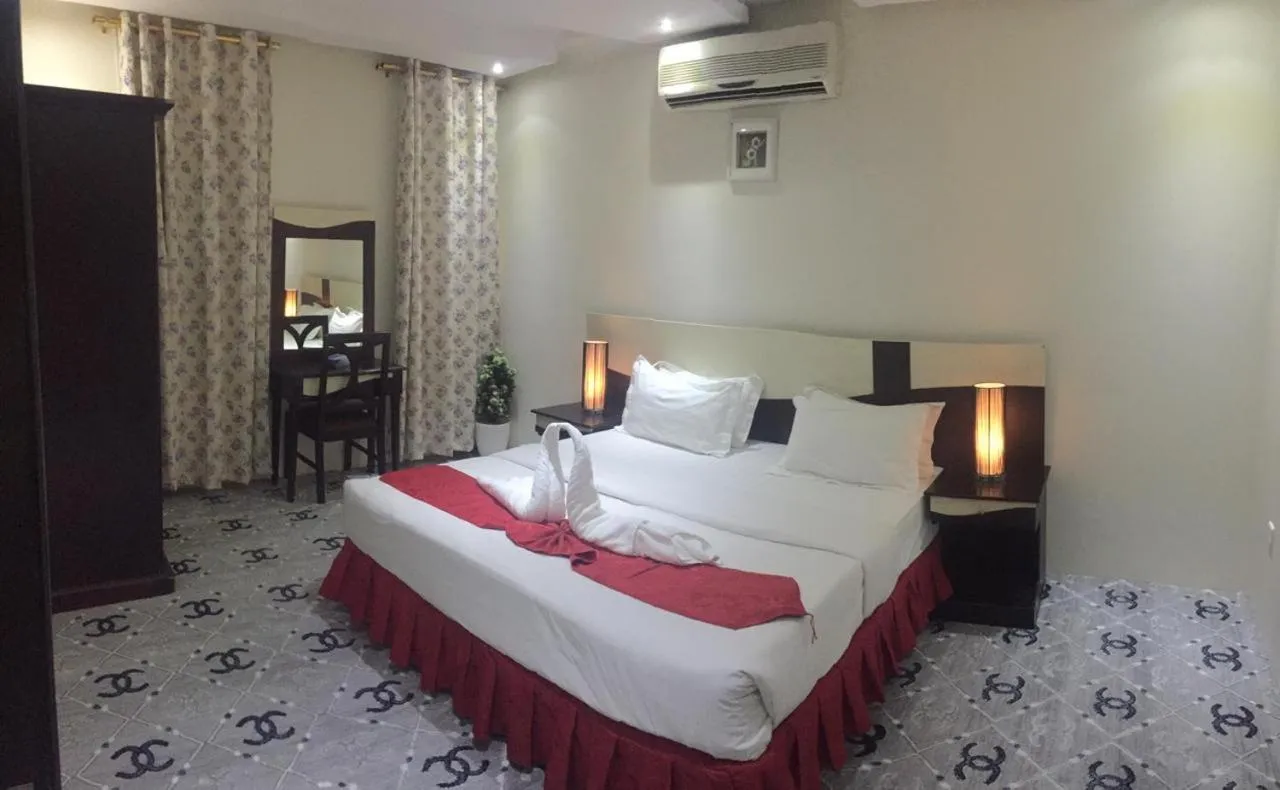 Bed in Merfal Hotel Apartments Al Taawan