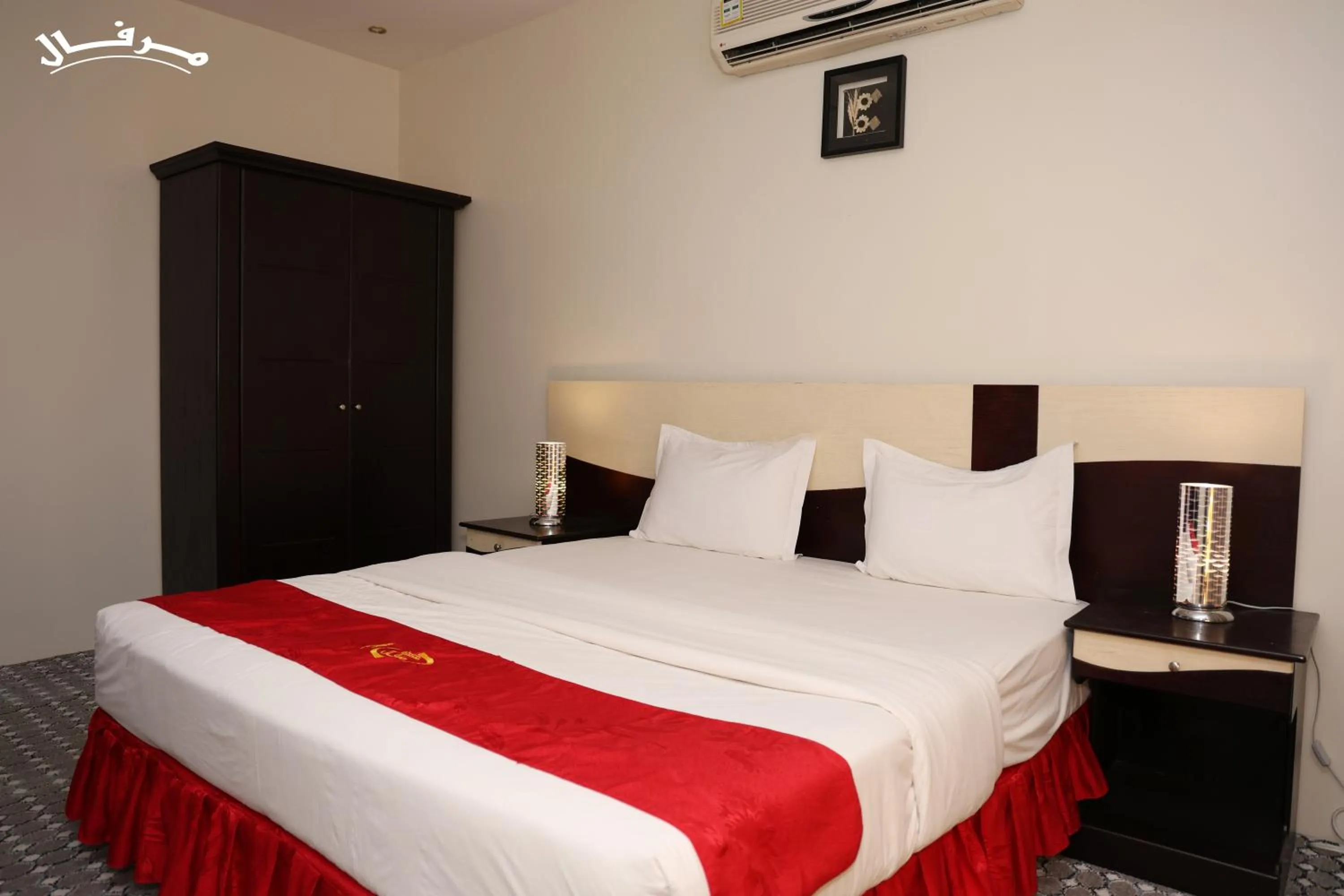 Bed in Merfal Hotel Apartments Al Taawan