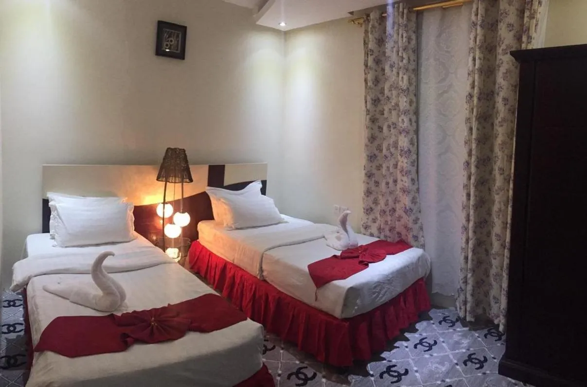 Bedroom in Merfal Hotel Apartments Al Taawan