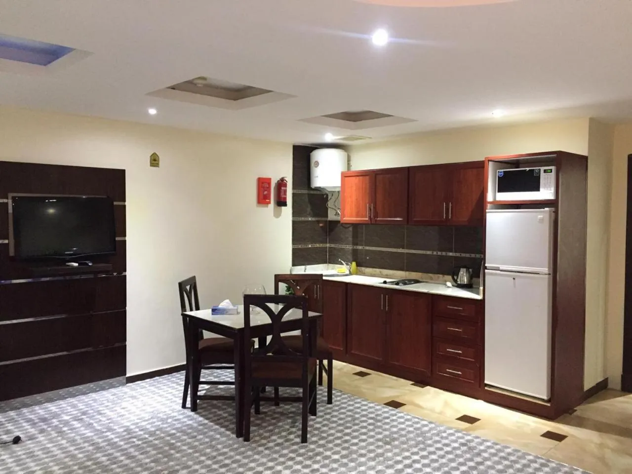 Kitchen or kitchenette in Merfal Hotel Apartments Al Taawan