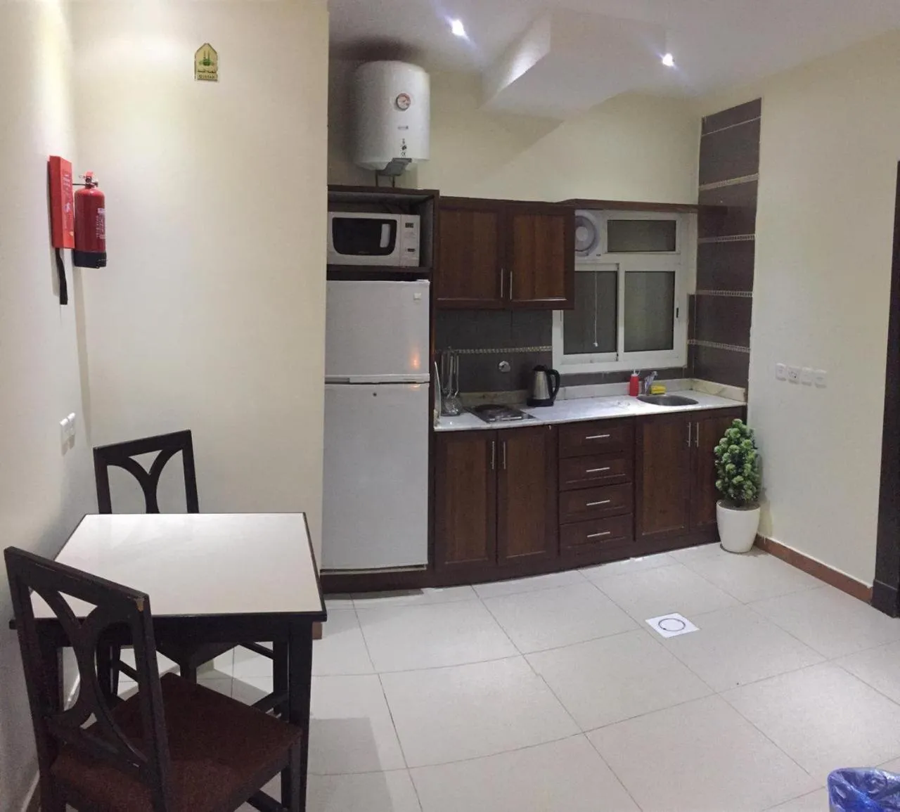 Kitchen or kitchenette in Merfal Hotel Apartments Al Taawan