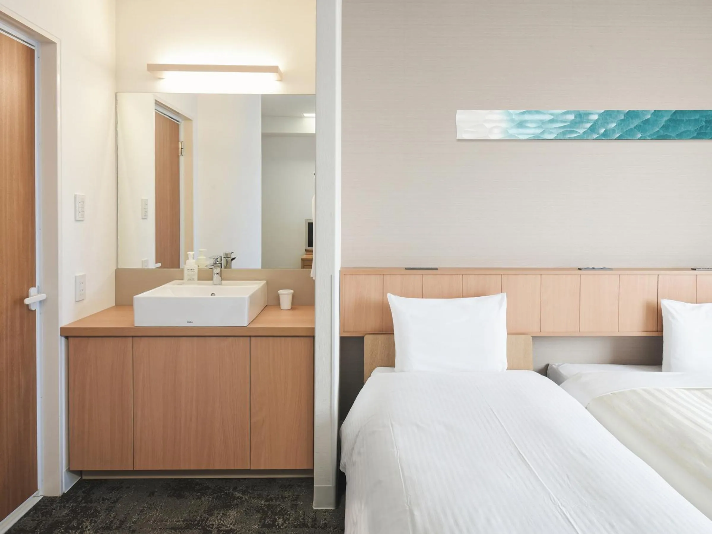 Bed in Vessel Hotel Ishigakijima