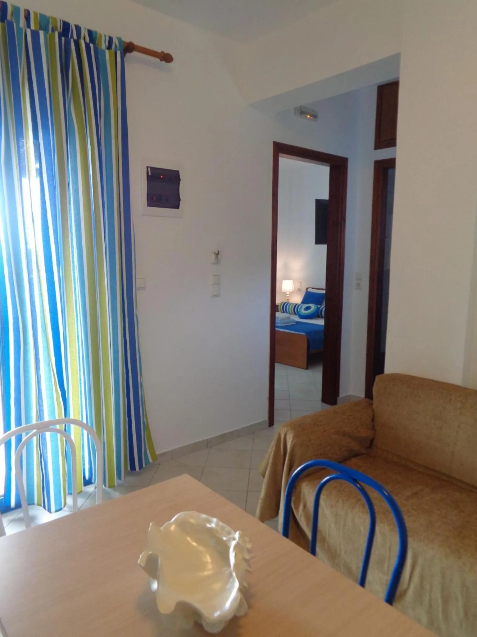 Seating area, Bed in Gaitani Village