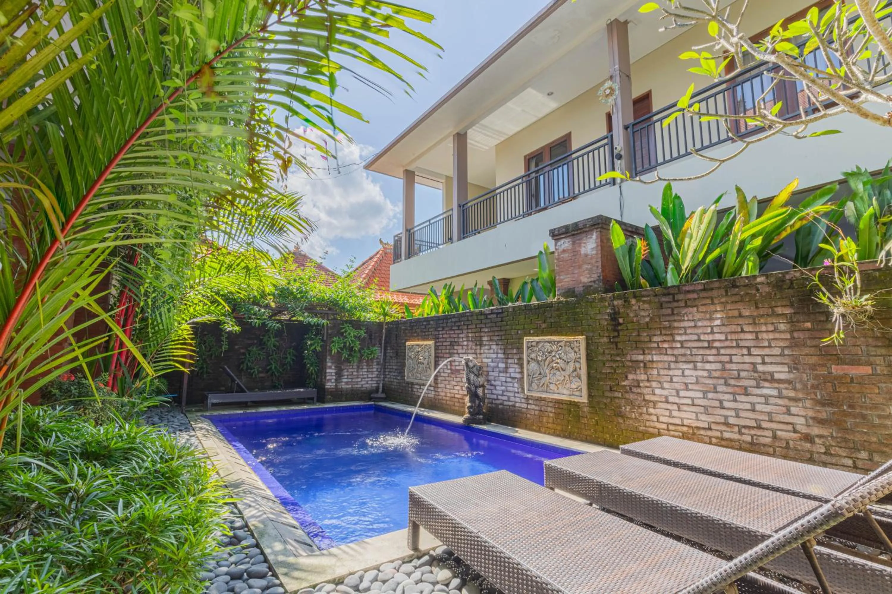 Swimming pool in Komala Homestay