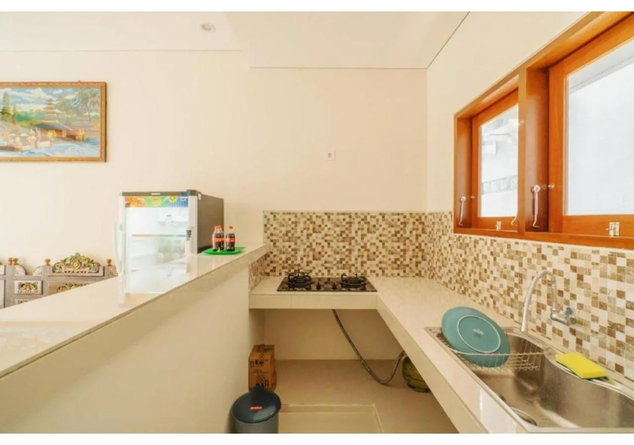 kitchen in Komala Homestay