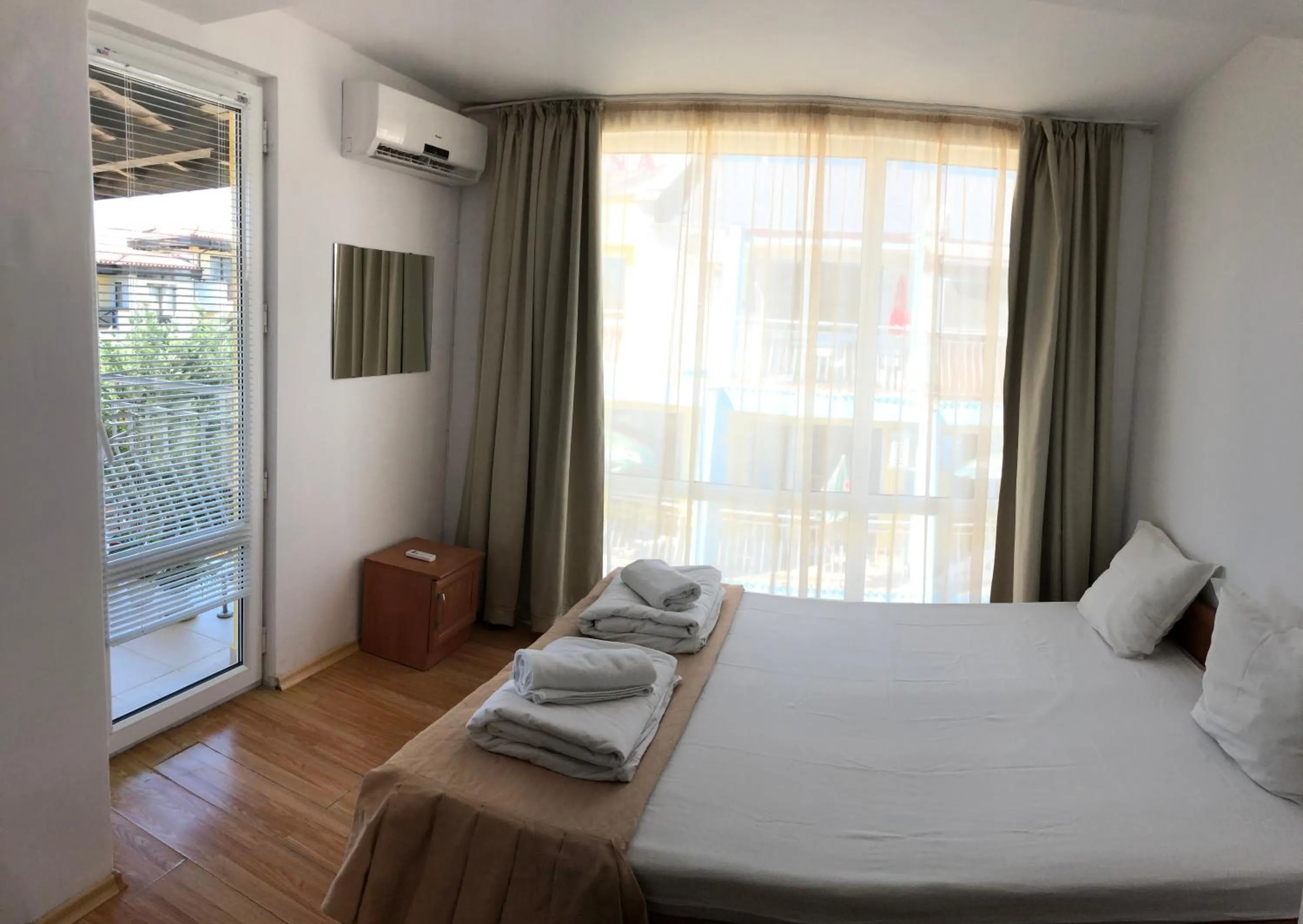 Bed in Family Hotel Littoral