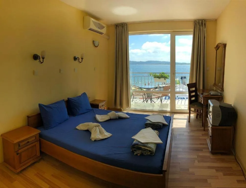 Bed in Family Hotel Littoral