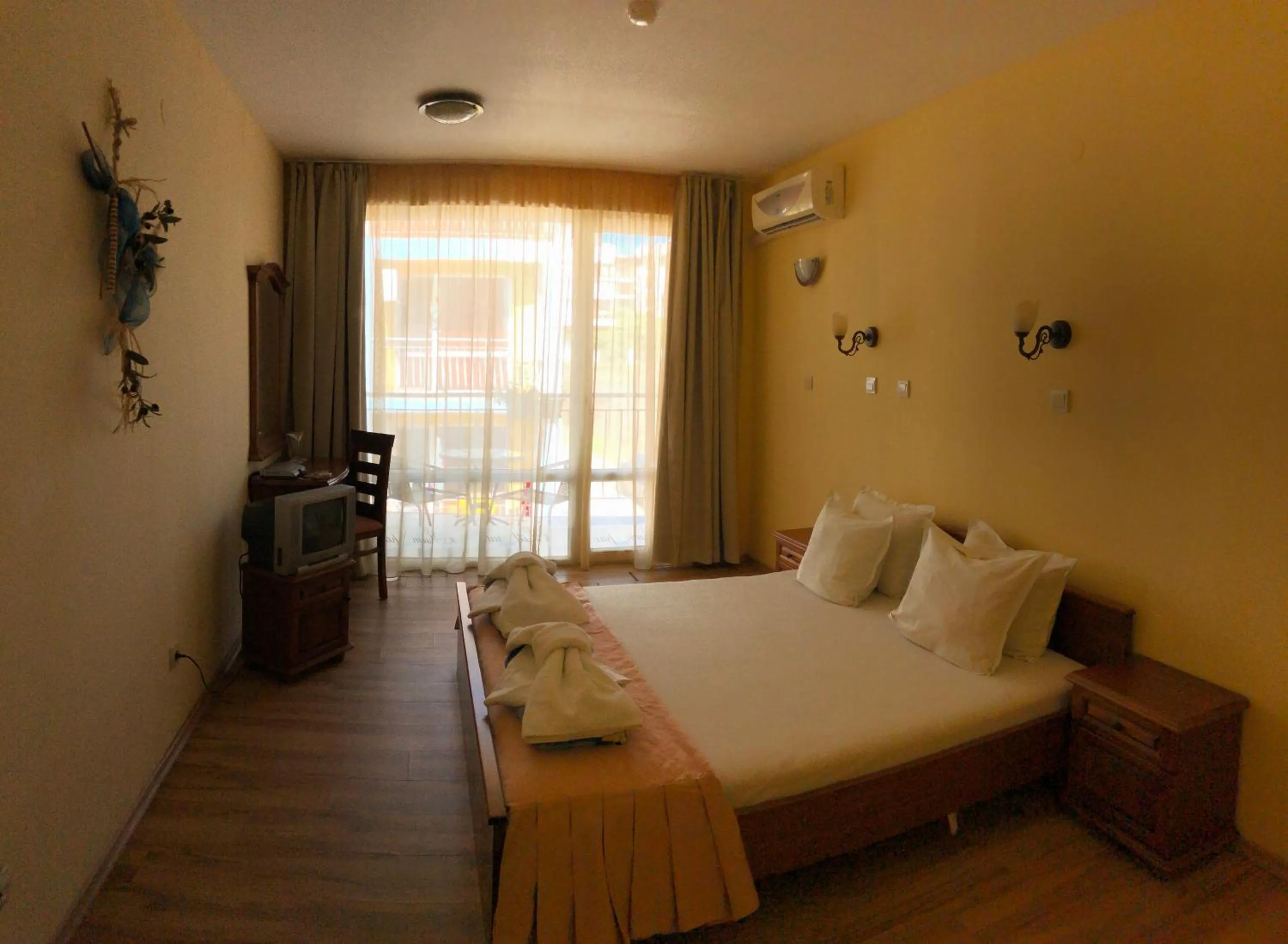 Bed in Family Hotel Littoral