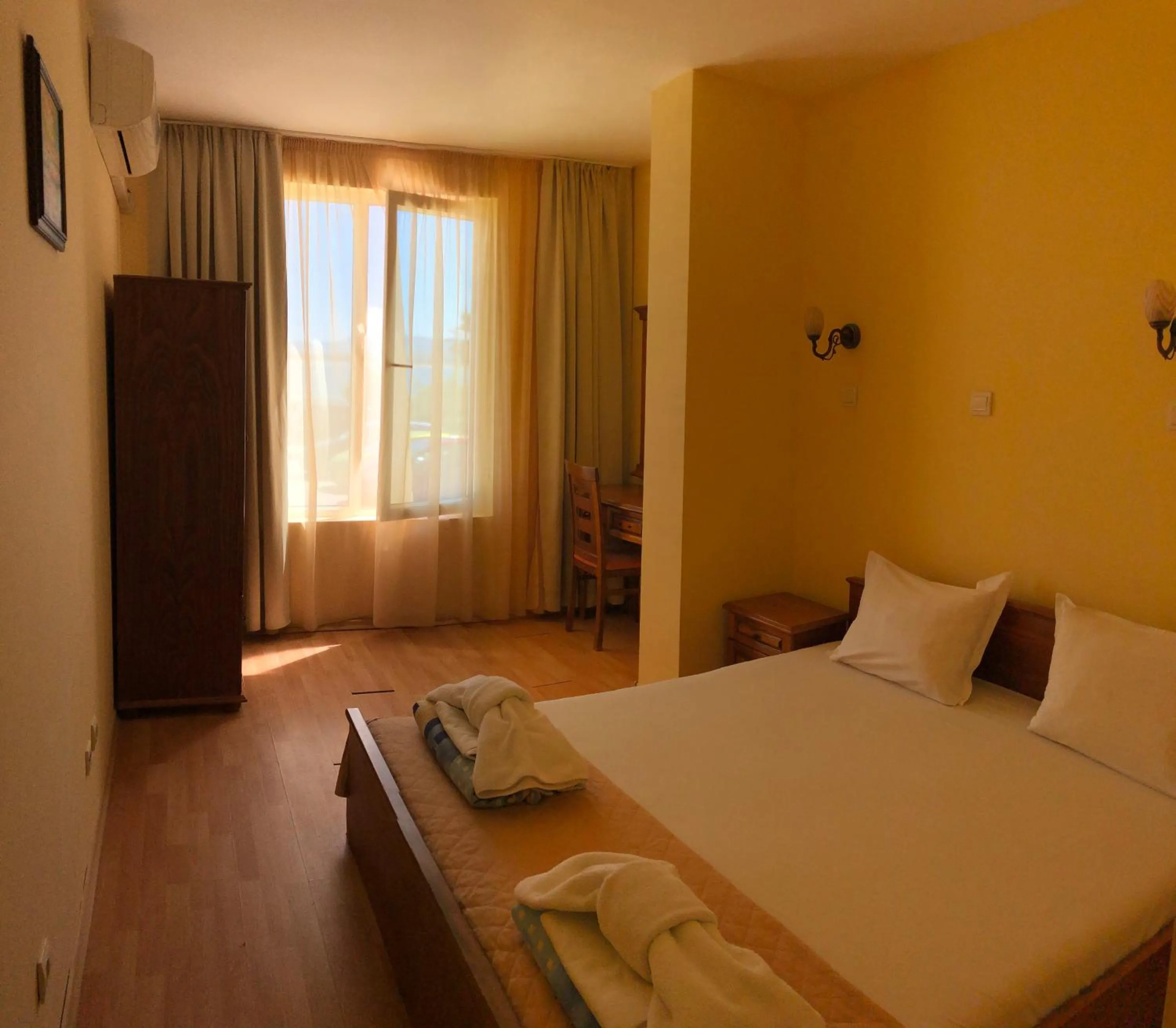 Bed in Family Hotel Littoral