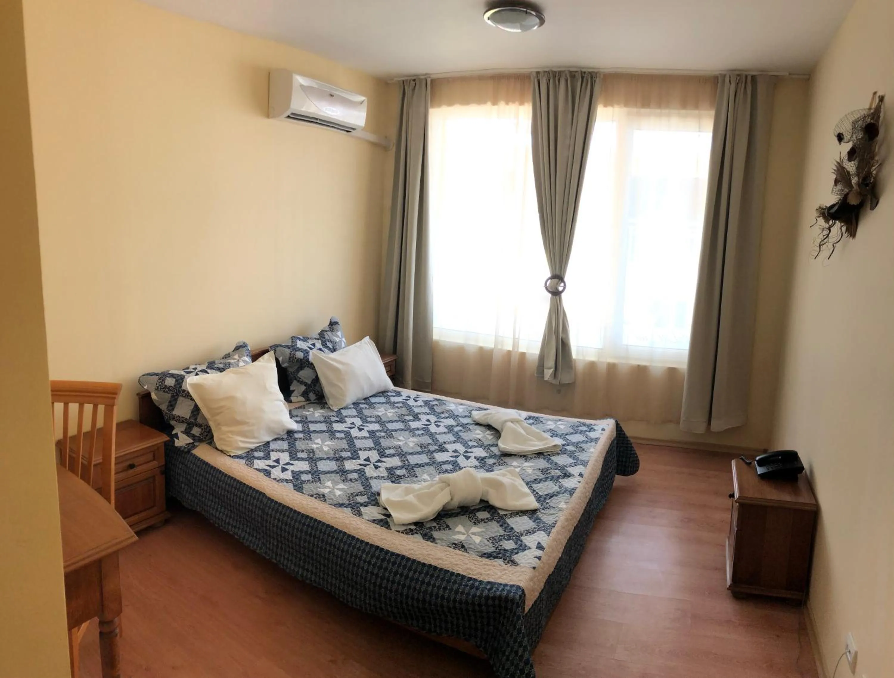 Bed in Family Hotel Littoral