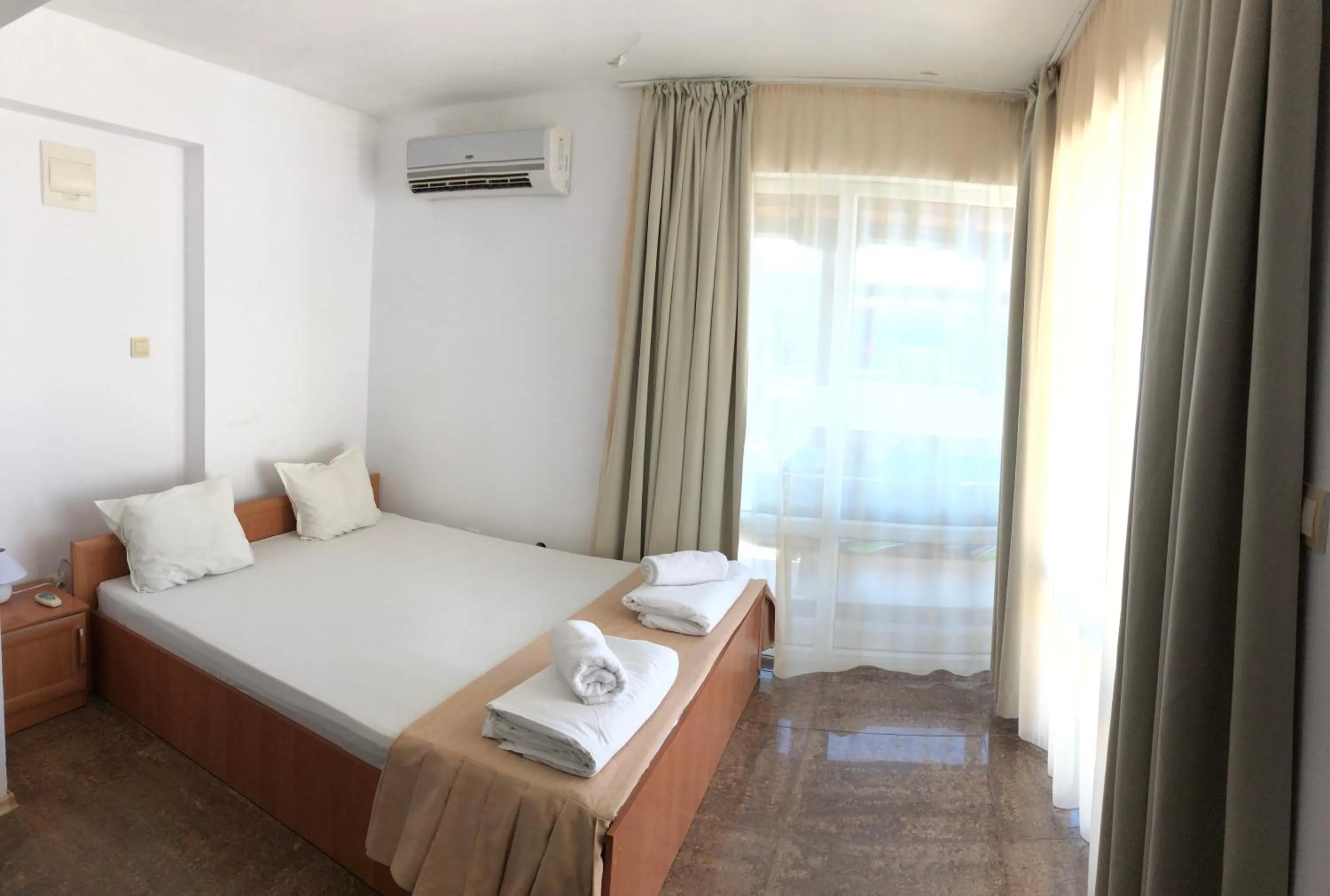 Bed in Family Hotel Littoral