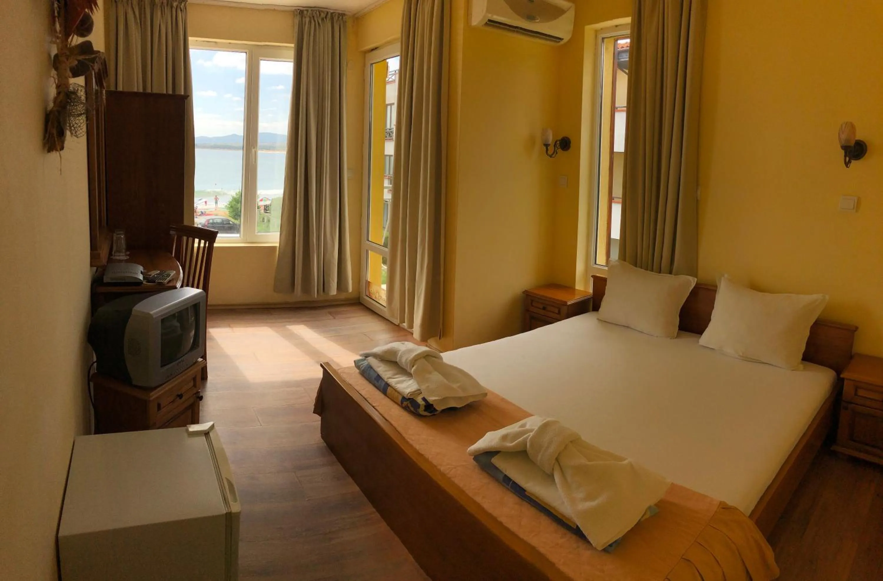 Bed in Family Hotel Littoral